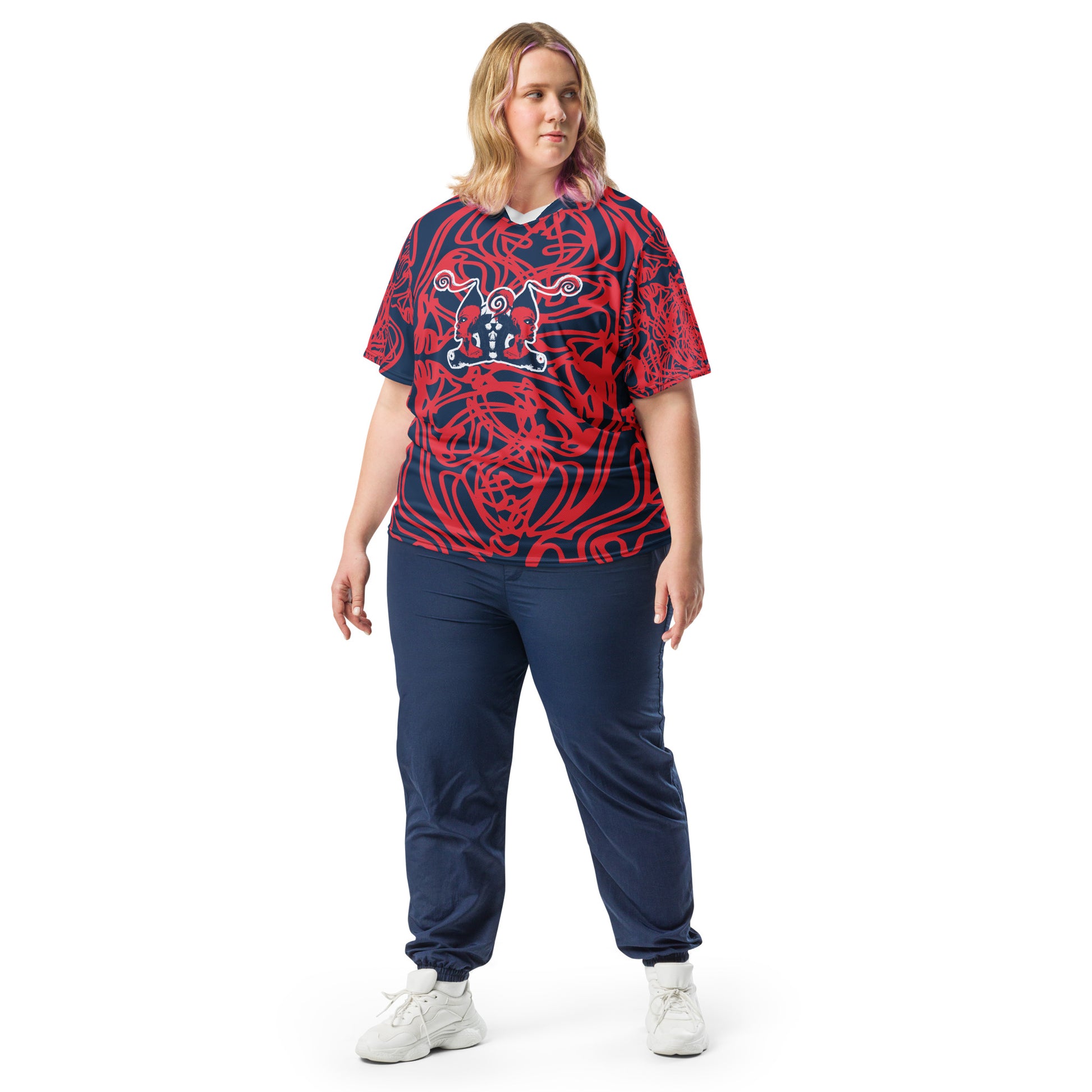 Bold navy and red streetwear t-shirt featuring hand-drawn tribal patterns and mirrored face design, culturally inspired and handcrafted for modern, edgy style – KLOE fashion.