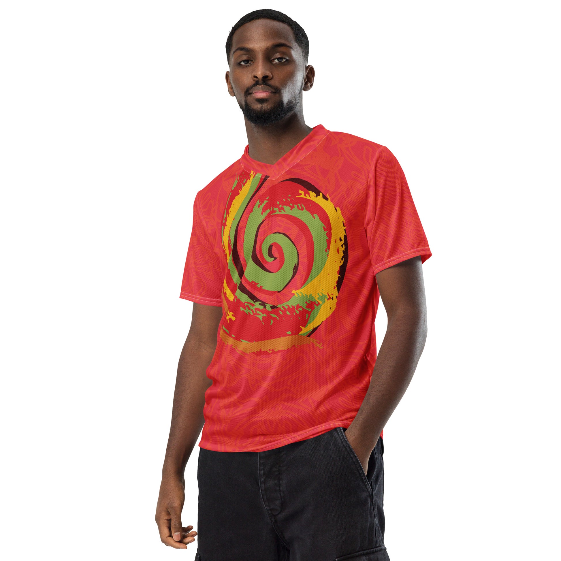 Red sports jersey with bold swirl on the front and mirrored face design on the back, inspired by cultural art and self-expression.