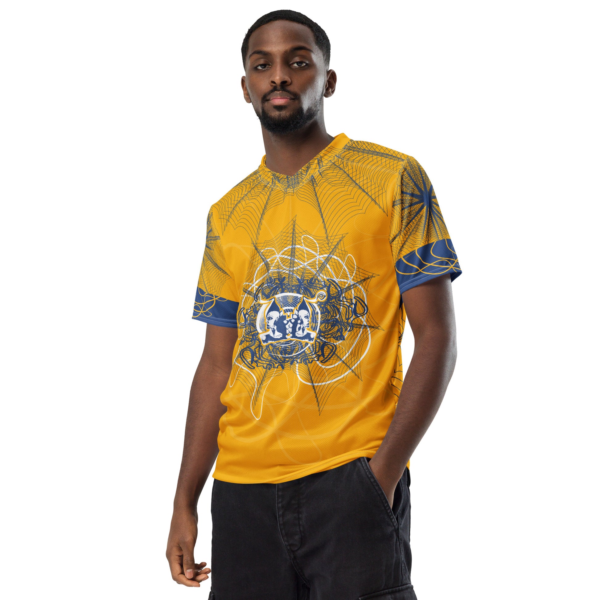 Front view of a golden yellow sports jersey featuring intricate navy web-like linework and a bold mirrored face design at the center, blending hand-drawn art with streetwear energy.