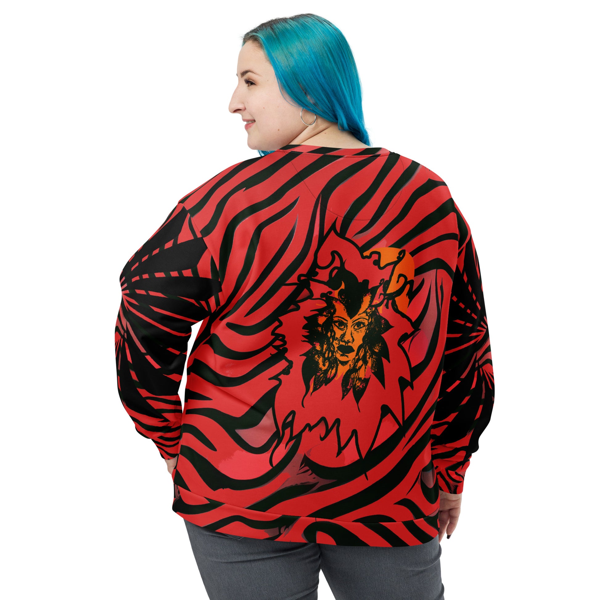 Back view of a plus size model wearing a bold red and black unisex sweatshirt from Kloe Store featuring a striking artistic face design, showcasing unique streetwear style with a vibrant, swirling pattern.