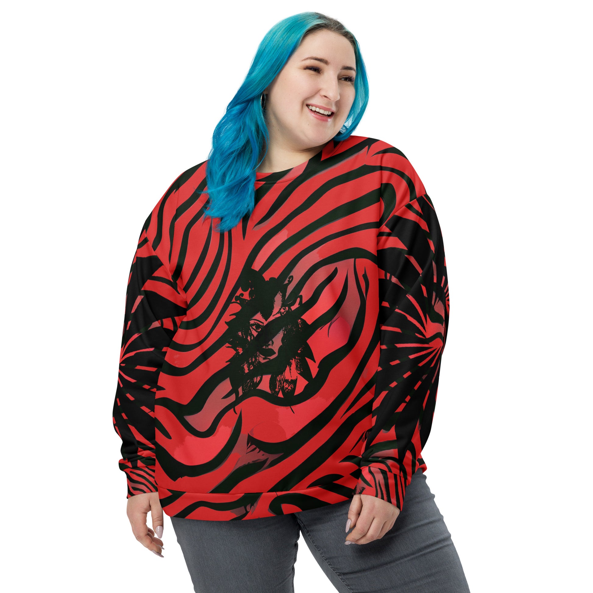 Front view of a  plus size model wearing a bold red and black unisex sweatshirt from Kloe Store featuring a striking artistic face design, showcasing unique streetwear style with a vibrant, swirling pattern.