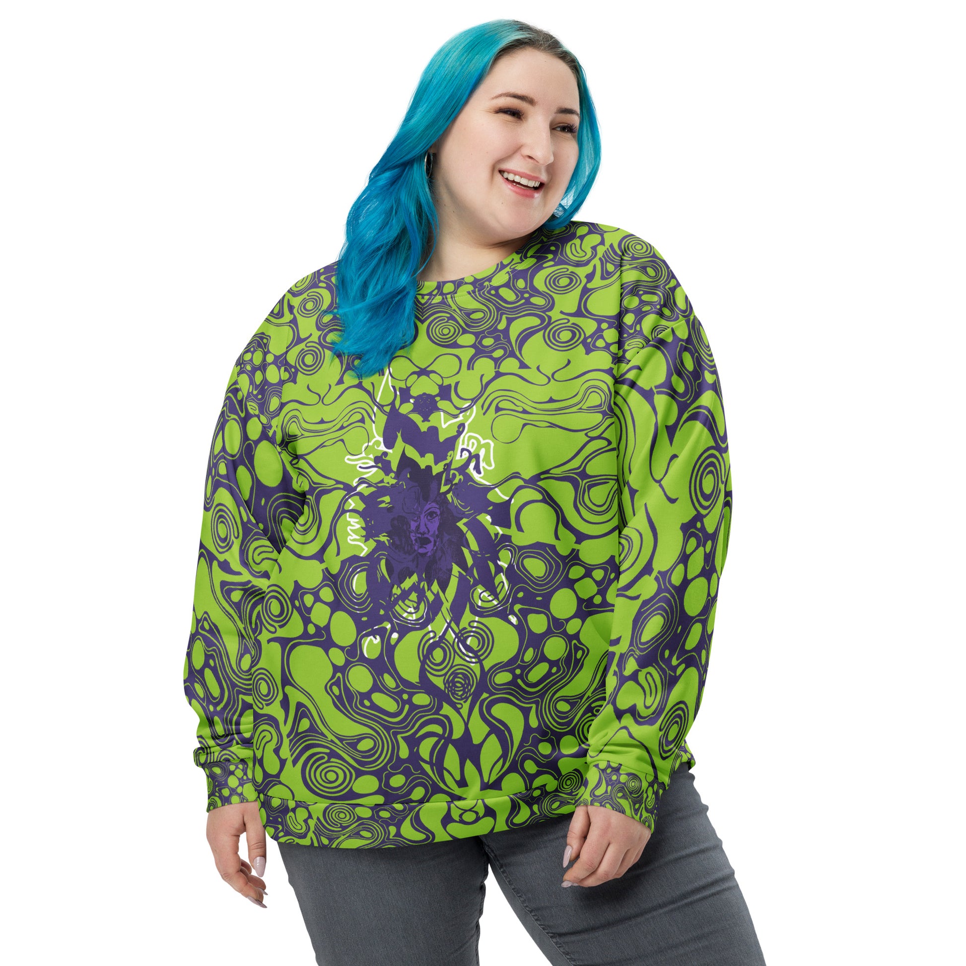 A model wearing green and purple unisex sweatshirt from Kloe Store featuring bold abstract patterns and a central artistic face design on both front and back, perfect for an edgy and modern streetwear style