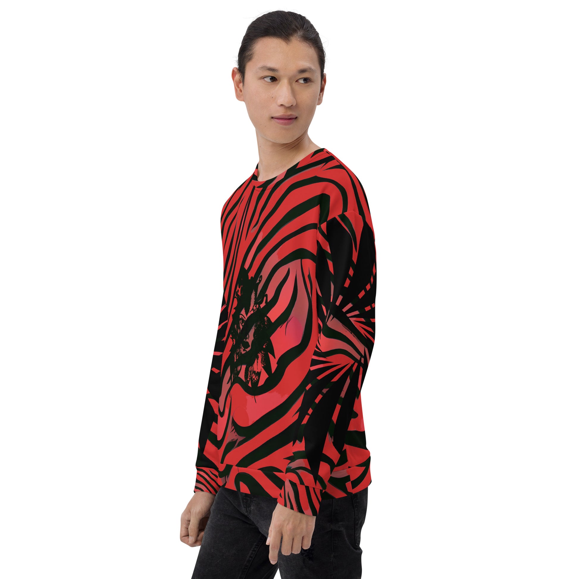 Front view of a model wearing a bold red and black unisex sweatshirt from Kloe Store featuring a striking artistic face design, showcasing unique streetwear style with a vibrant, swirling pattern.