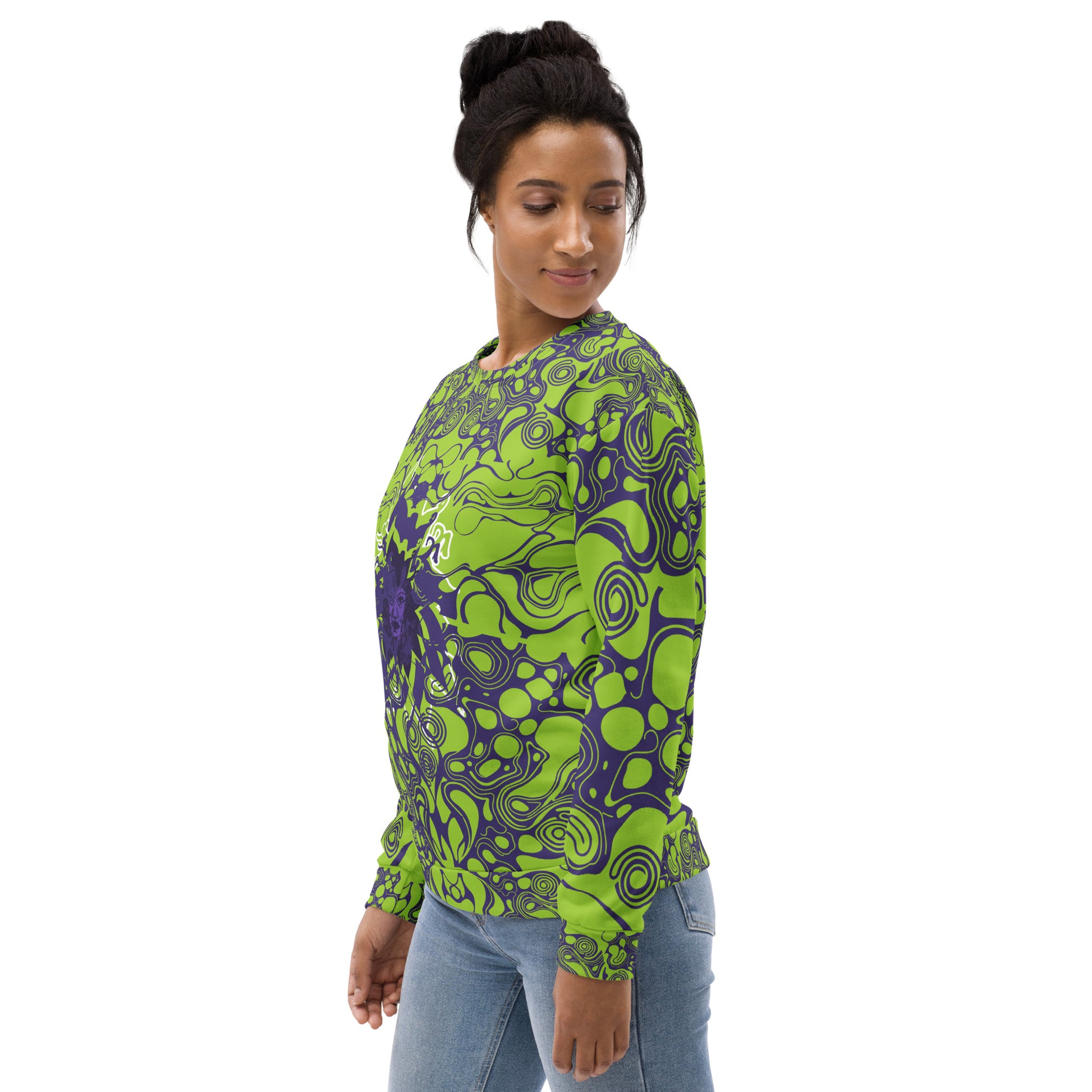 A model wearing green and purple unisex sweatshirt from Kloe Store featuring bold abstract patterns and a central artistic face design on both front and back, perfect for an edgy and modern streetwear style.