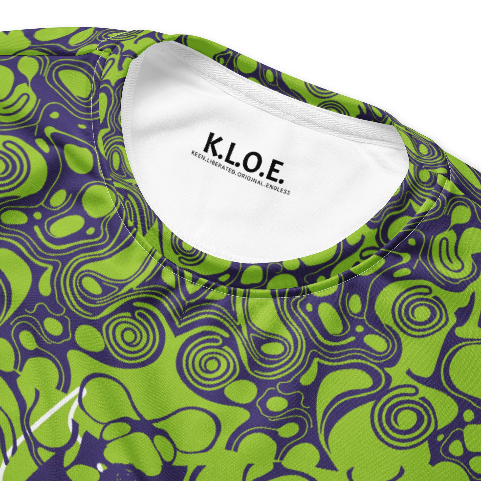 Green and purple unisex sweatshirt from Kloe Store featuring bold abstract patterns and a central artistic face design on both front and back, perfect for an edgy and modern streetwear style, detail view.