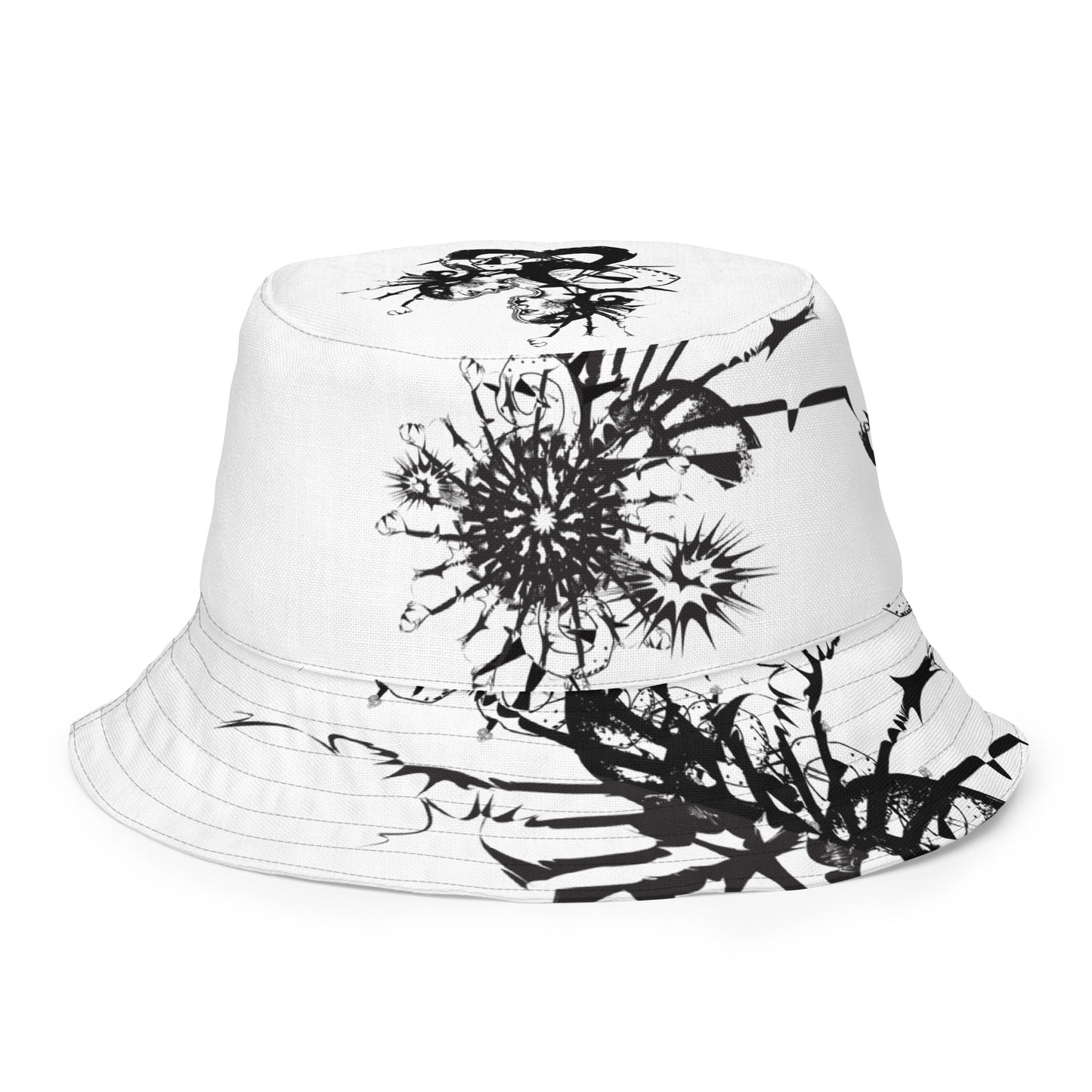 All-over print reversible bucket hat by K.L.O.E featuring black hand-drawn, culturally inspired artwork on a white background—expressing individuality and transformation through intricate abstract symbolism.