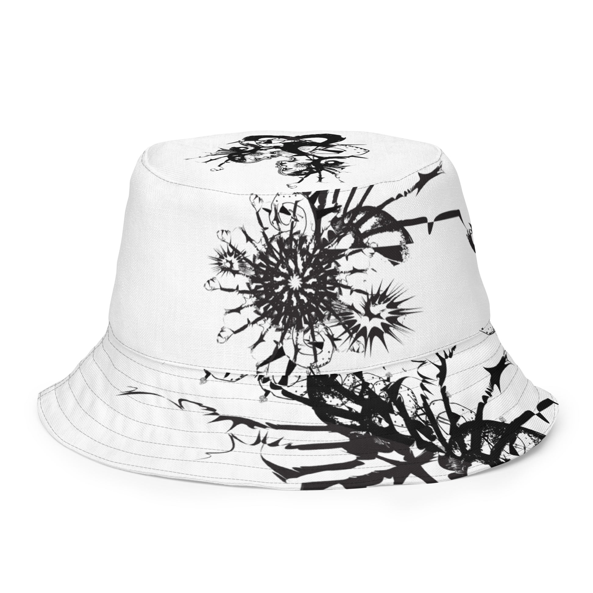 All-over print reversible bucket hat by K.L.O.E featuring black hand-drawn, culturally inspired artwork on a white background—expressing individuality and transformation through intricate abstract symbolism.