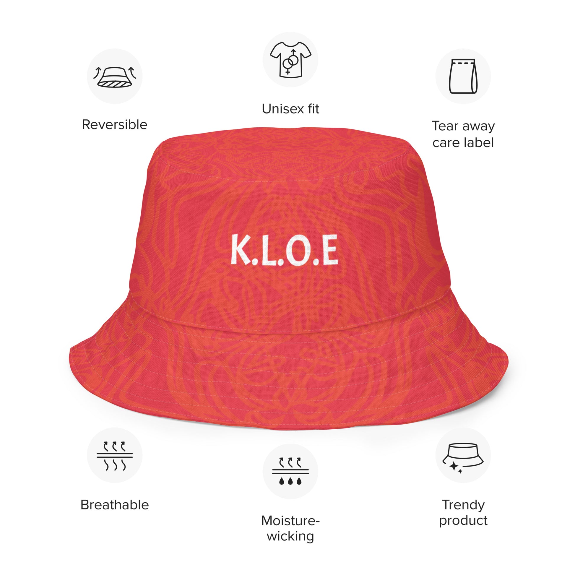 Reversible red-orange bucket hat with cultural swirl design and mirrored face motif on one side, and K.L.O.E wordmark on the other.