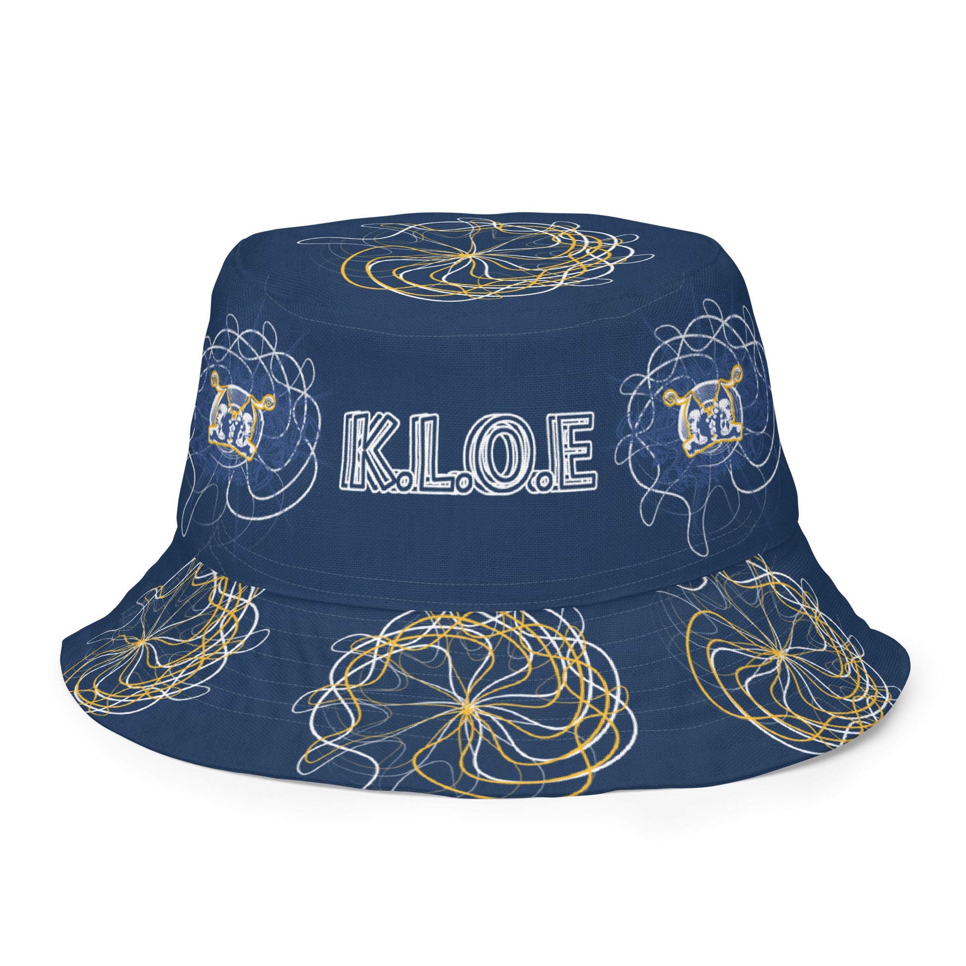 Reversible bucket hat featuring navy and golden yellow sides with abstract white linework and mirrored face emblems, blending hand-drawn cultural art with bold, expressive streetwear style.
