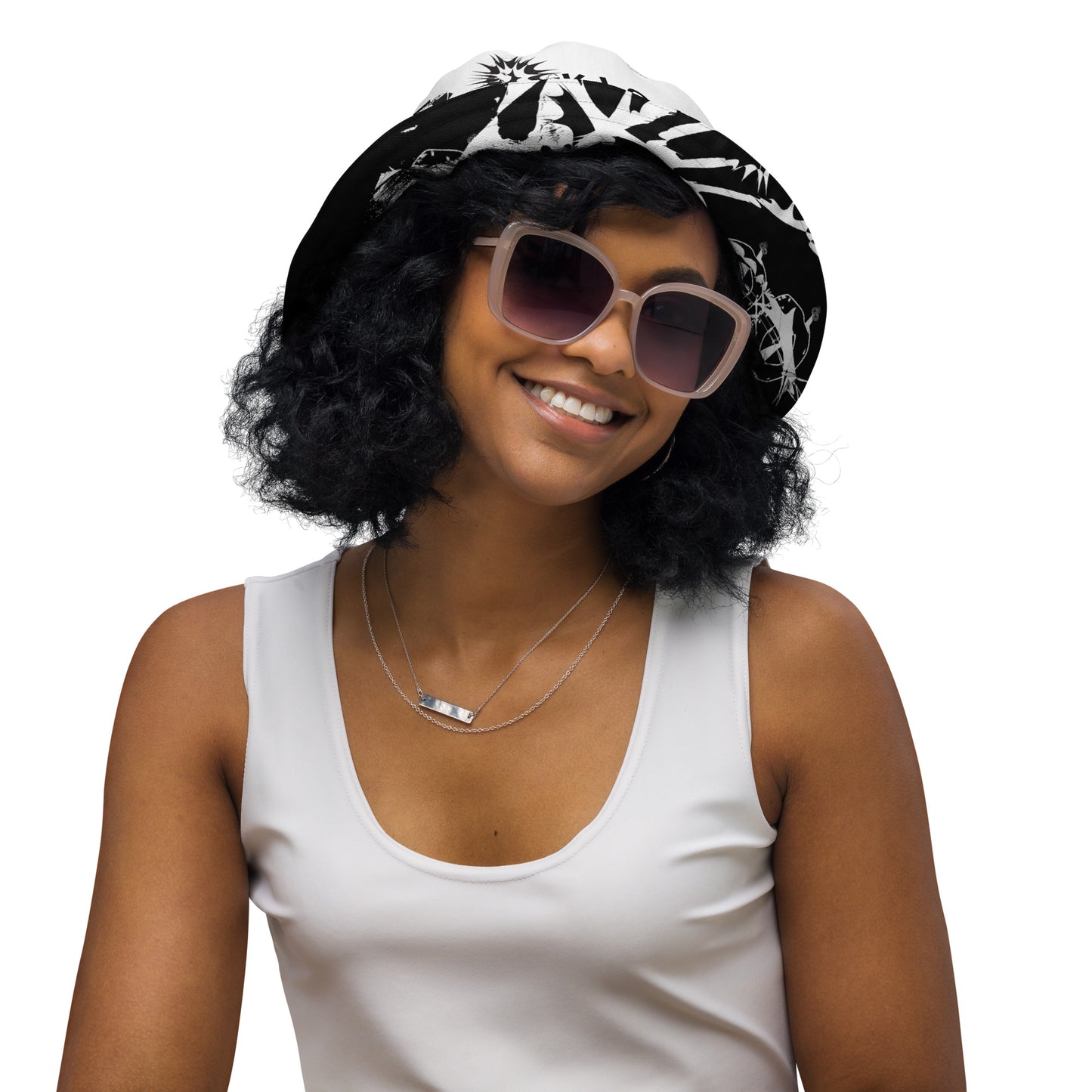 All-over print reversible bucket hat by K.L.O.E featuring black hand-drawn, culturally inspired artwork on a white background—expressing individuality and transformation through intricate abstract symbolism.