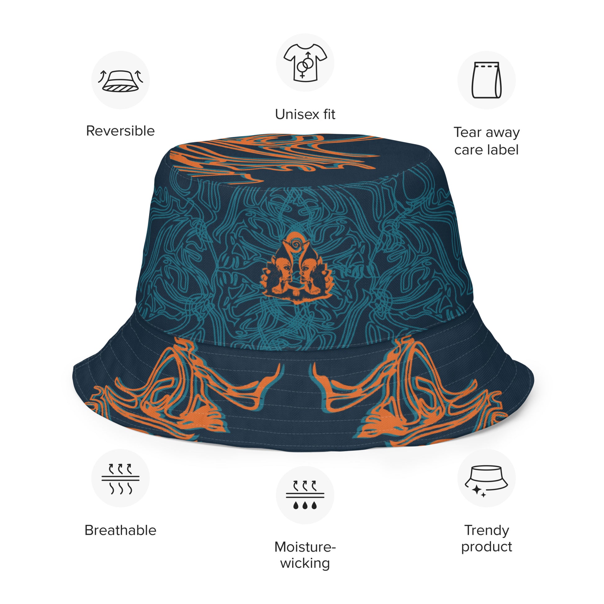 Reversible bucket hat featuring a small orange mirrored face motif and bold tribal-inspired patterns, blending art and streetwear.