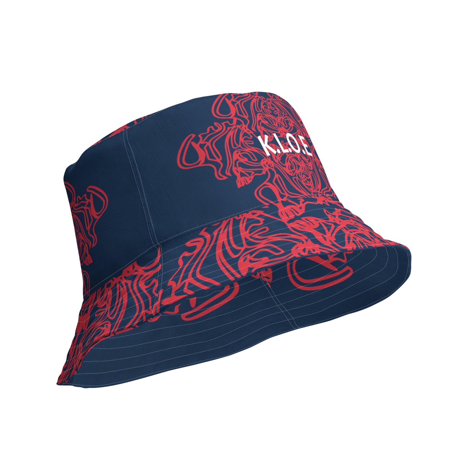 Bold reversible streetwear bucket hat featuring hand-drawn tribal patterns on one side and a mirrored face design on the other, crafted in navy and red for an edgy, modern look – KLOE fashion.