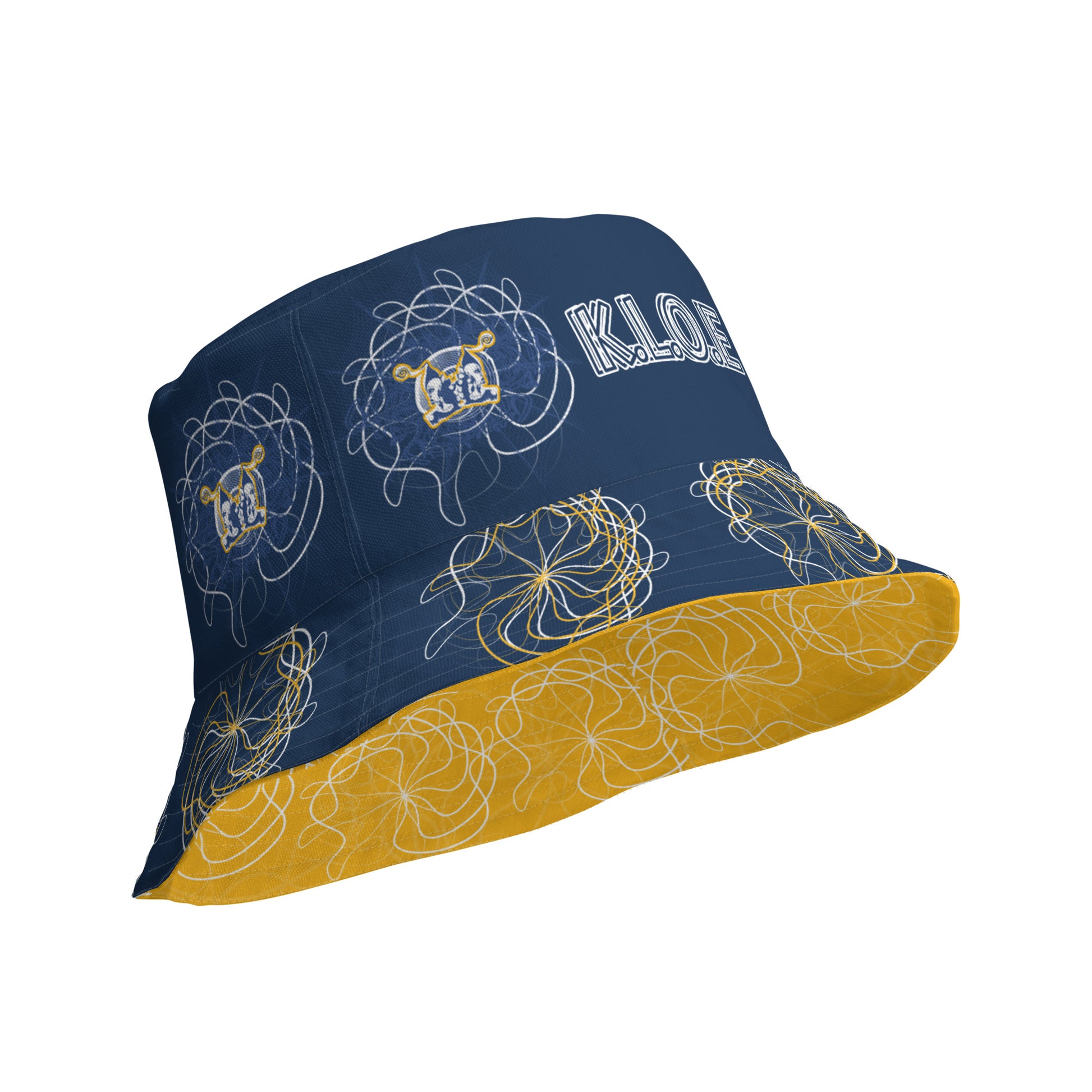 Reversible bucket hat featuring navy and golden yellow sides with abstract white linework and mirrored face emblems, blending hand-drawn cultural art with bold, expressive streetwear style.