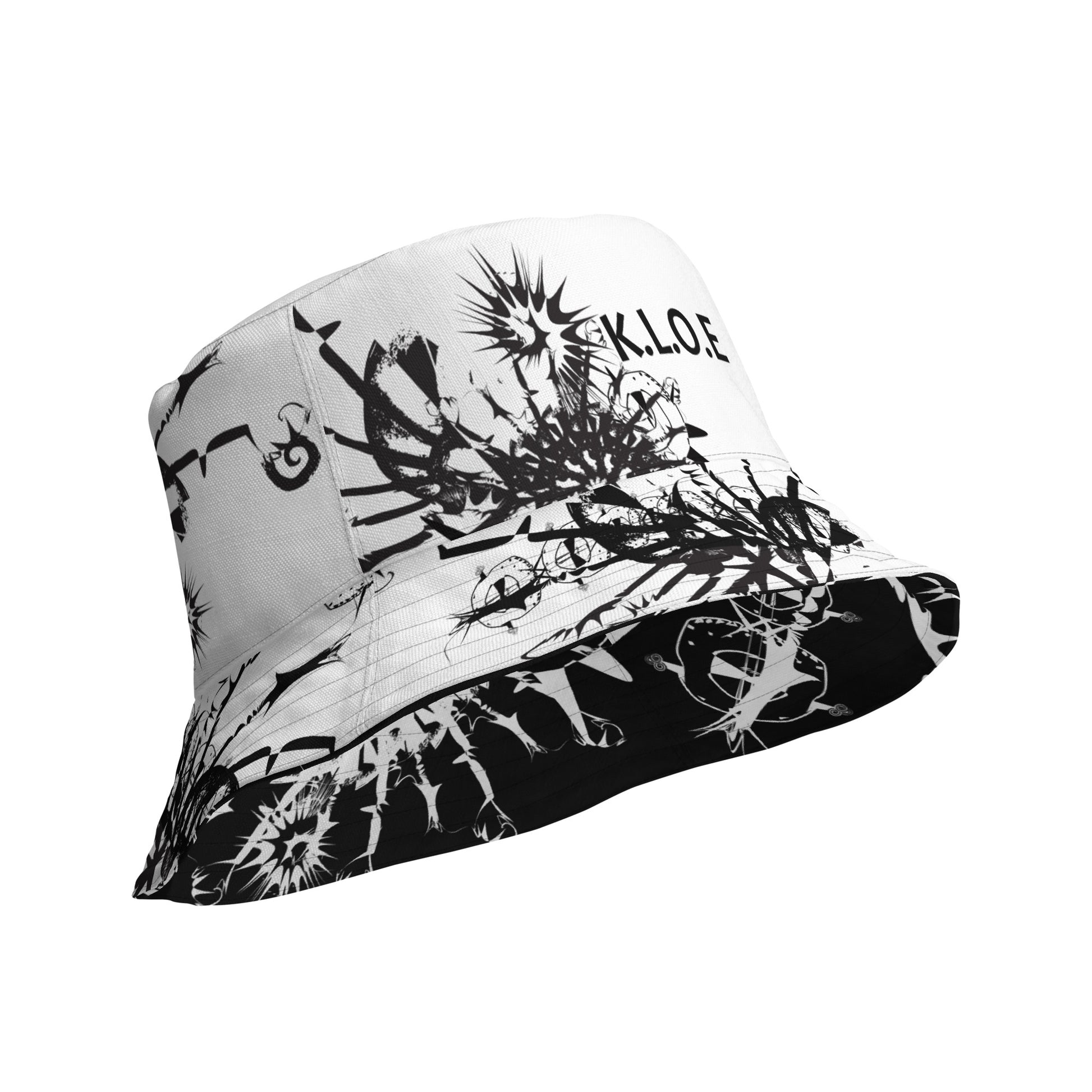 All-over print reversible bucket hat by K.L.O.E featuring black hand-drawn, culturally inspired artwork on a white background—expressing individuality and transformation through intricate abstract symbolism.