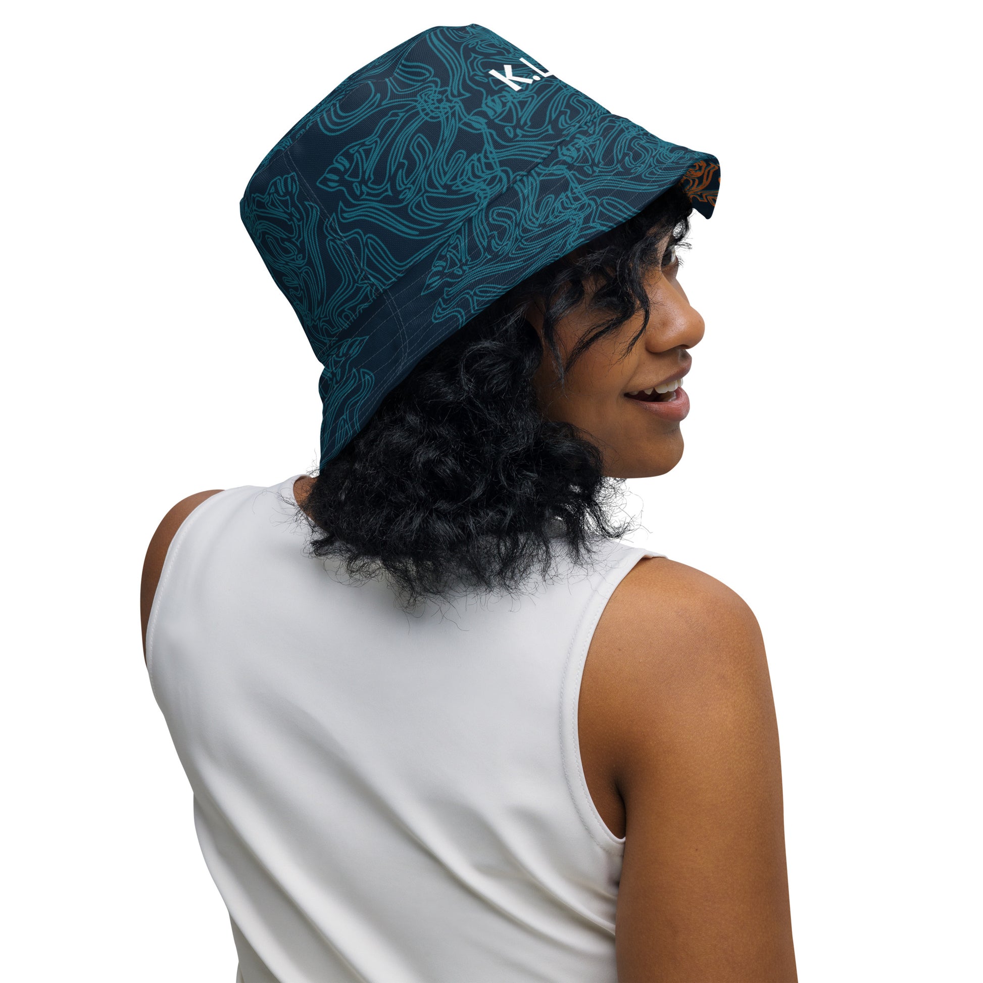 Navy blue bucket hat with cyan line art and 'K.L.O.E' branding on the front, offering a minimal yet artistic aesthetic, worn by a model.