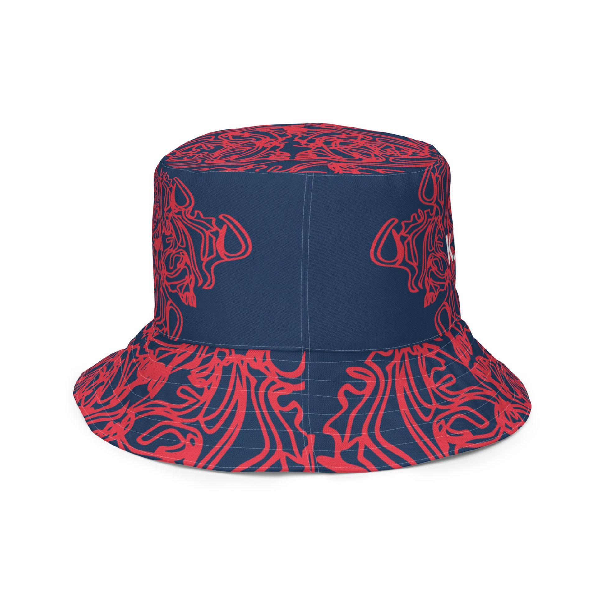 Bold reversible streetwear bucket hat featuring hand-drawn tribal patterns on one side and a mirrored face design on the other, crafted in navy and red for an edgy, modern look – KLOE fashion.