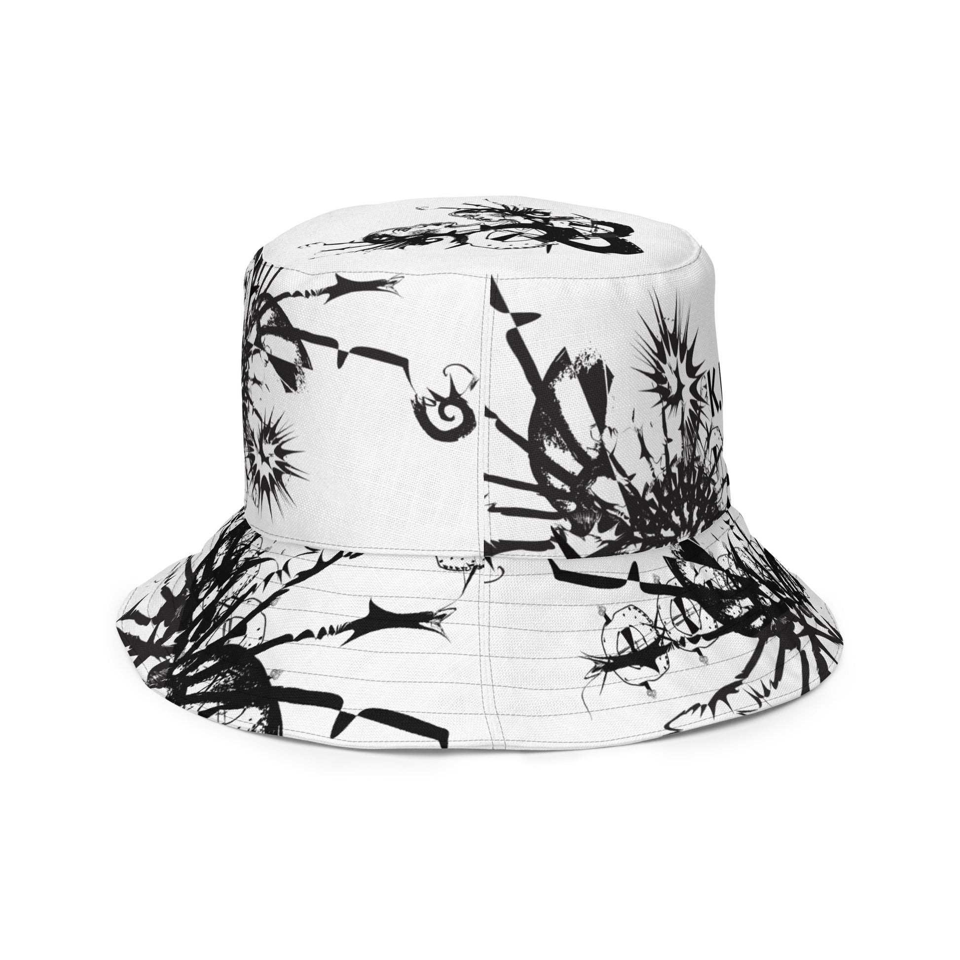 All-over print reversible bucket hat by K.L.O.E featuring black hand-drawn, culturally inspired artwork on a white background—expressing individuality and transformation through intricate abstract symbolism.