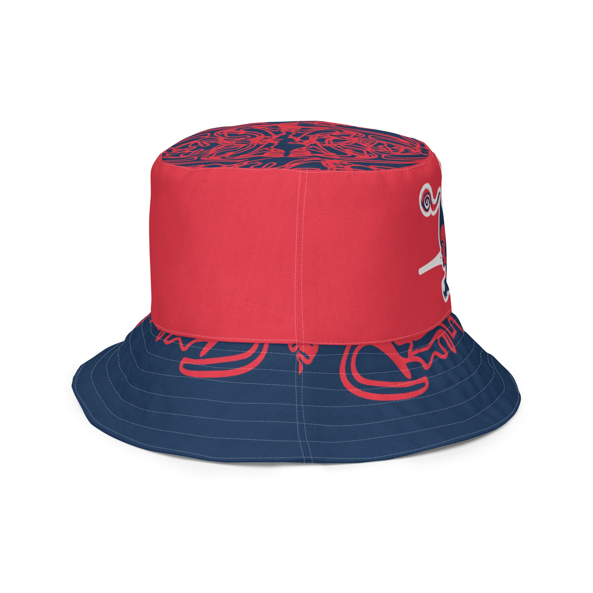 Bold reversible streetwear bucket hat featuring hand-drawn tribal patterns on one side and a mirrored face design on the other, crafted in navy and red for an edgy, modern look – KLOE fashion.