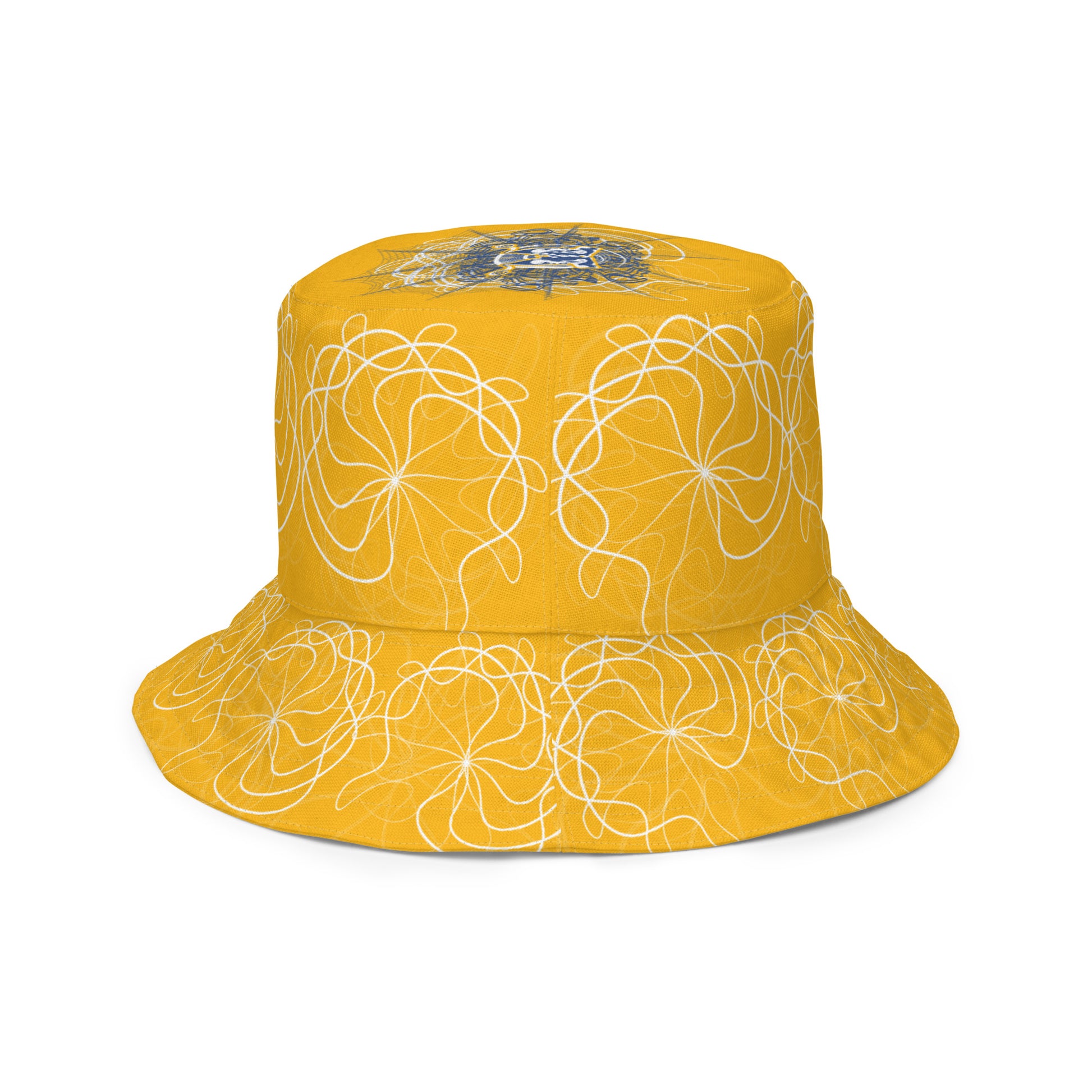 Reversible bucket hat featuring navy and golden yellow sides with abstract white linework and mirrored face emblems, blending hand-drawn cultural art with bold, expressive streetwear style.