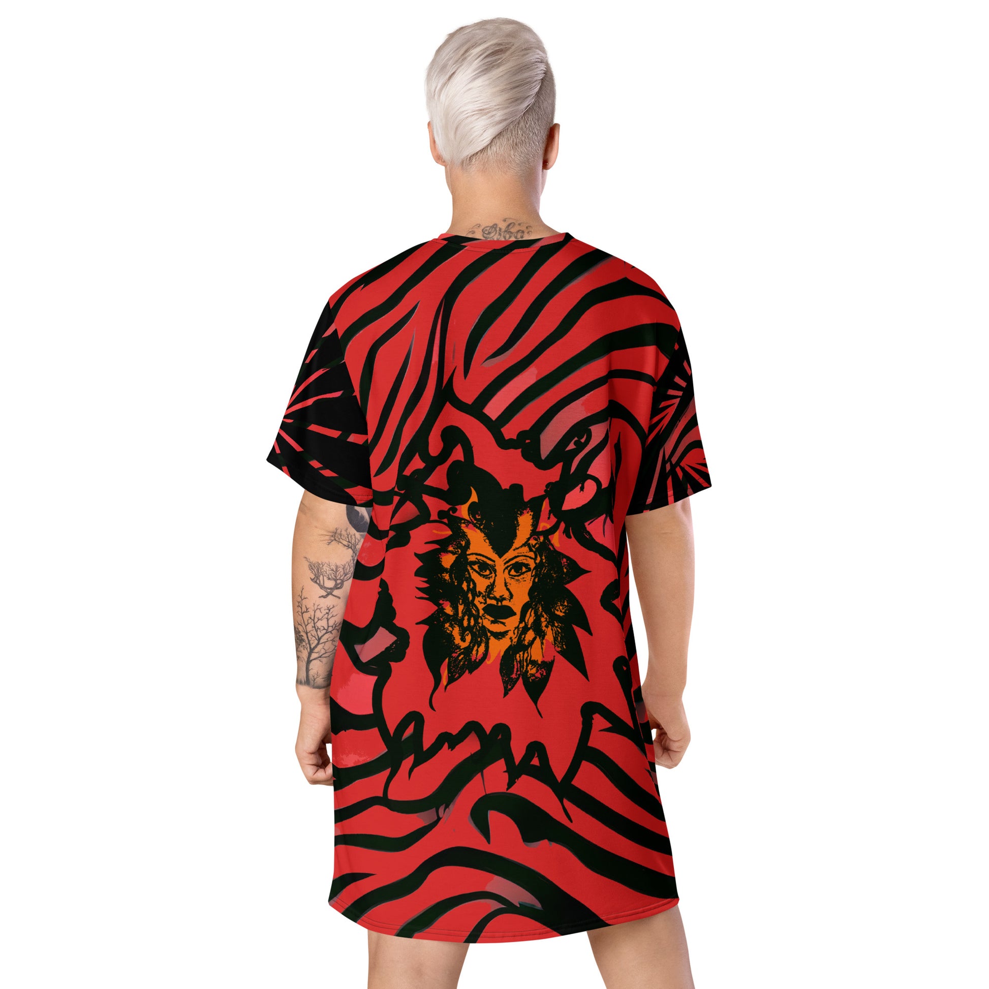 Model wearing a bold red and black t-shirt dress from Kloe Store with an artistic face design, showcasing a stylish and edgy streetwear look with striking patterns and a modern, casual fit, back view.
