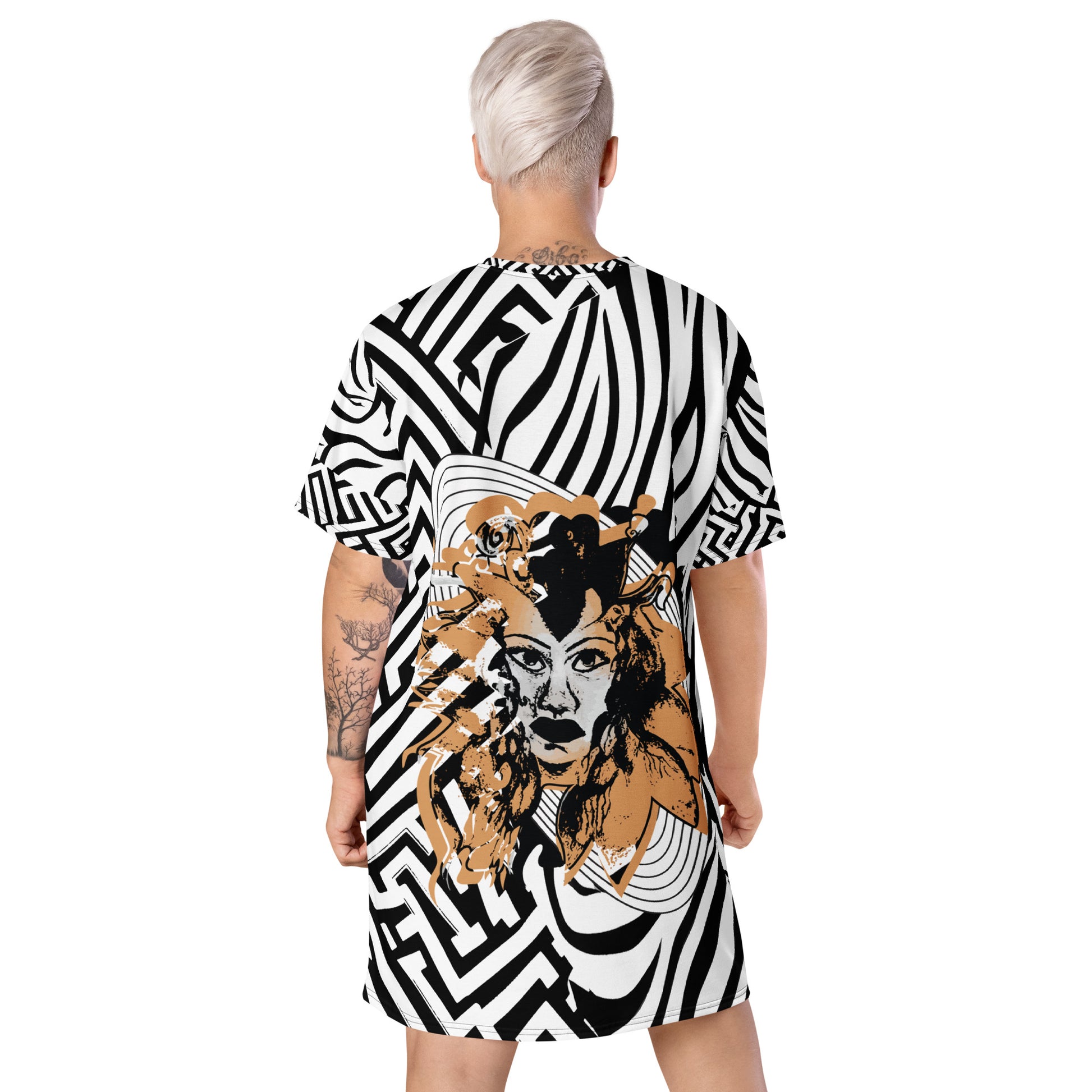 Model wearing bold black and white zebra print t-shirt dress from Kloe Store featuring an artistic face design in the center, showcasing unique streetwear style with abstract patterns and edgy fashion, back view.