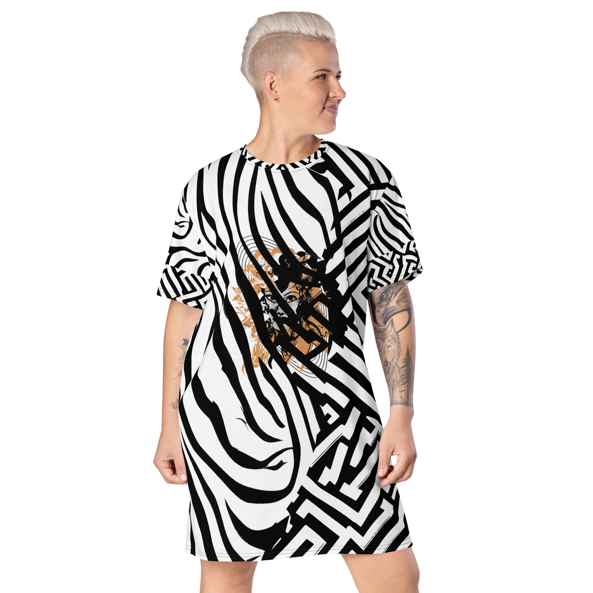 Model wearing bold black and white zebra print t-shirt dress from Kloe Store featuring an artistic face design in the center, showcasing unique streetwear style with abstract patterns and edgy fashion.