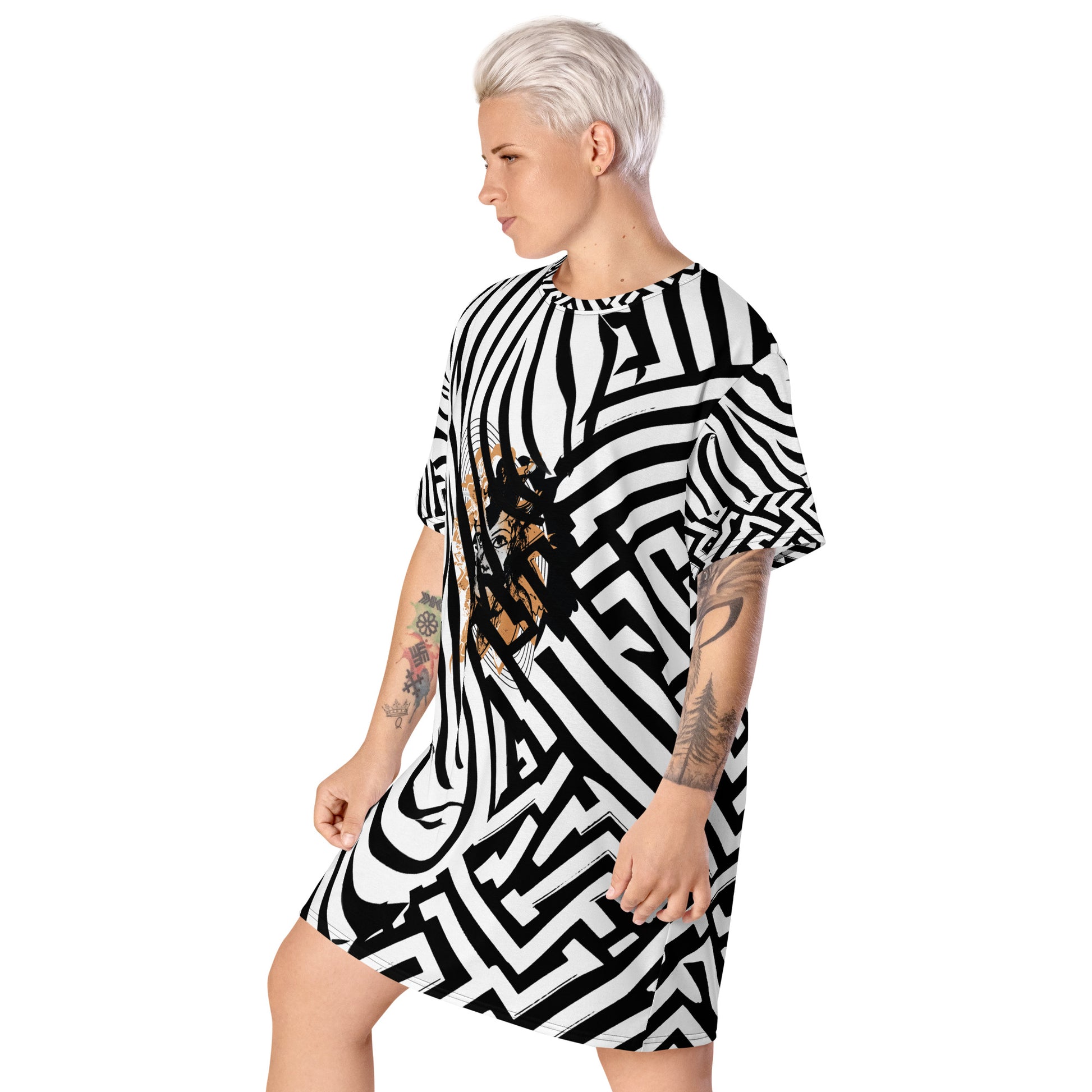 Model wearing bold black and white zebra print t-shirt dress from Kloe Store featuring an artistic face design in the center, showcasing unique streetwear style with abstract patterns and edgy fashion.