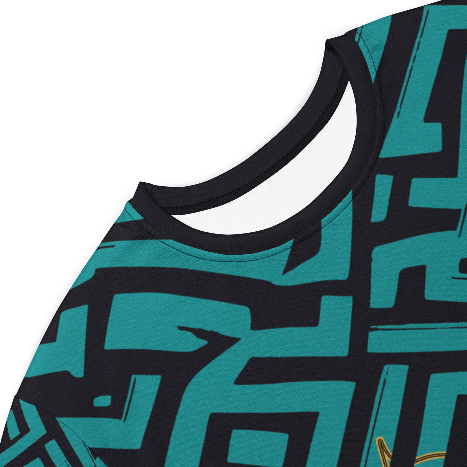 Detail view of a model wearing KLOE bohemian style dress featuring bold green and black geometric patterns with a central golden artistic face design, showcasing expressive and modern boho style fashion.