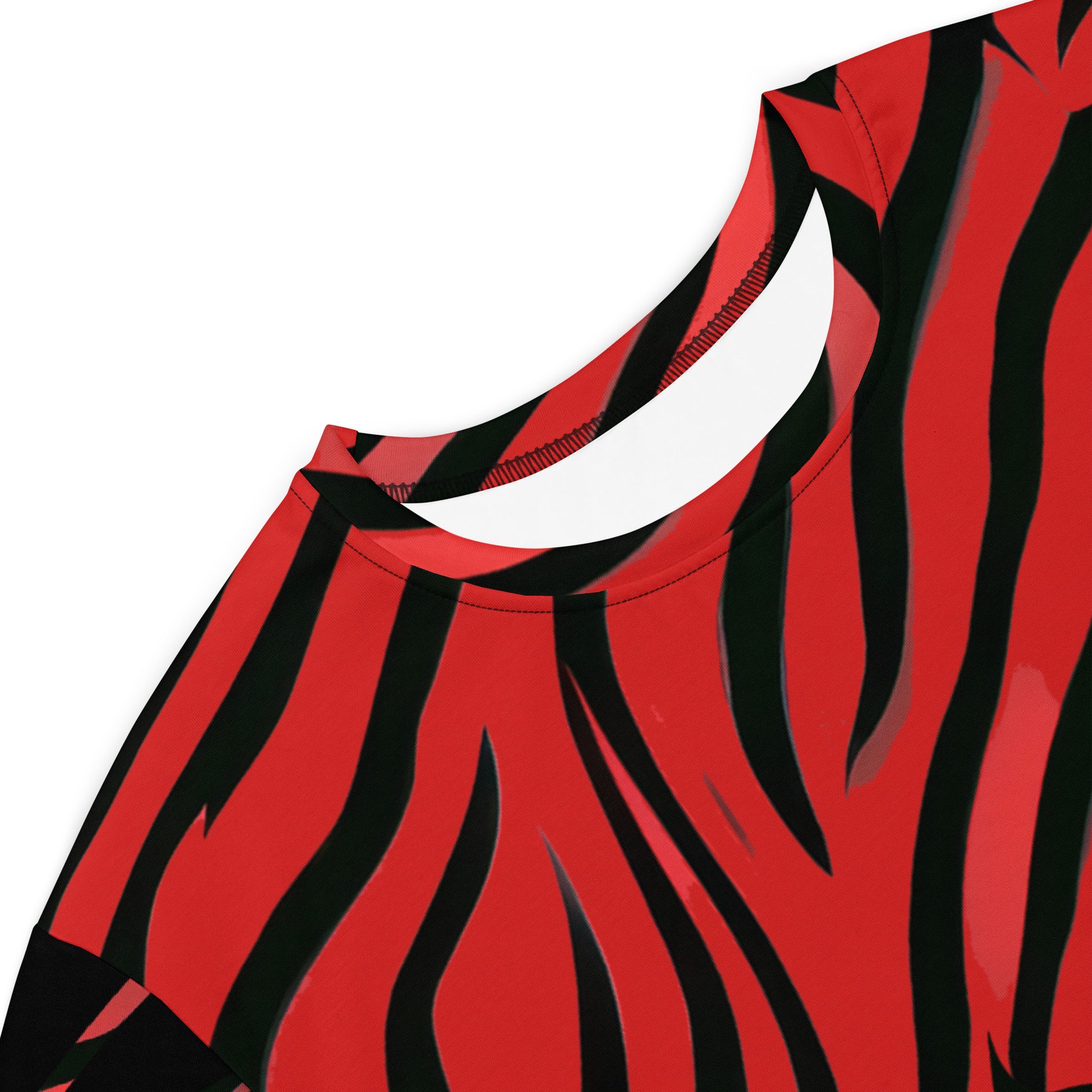 Bold red and black t-shirt dress from Kloe Store with an artistic face design, showcasing a stylish and edgy streetwear look with striking patterns and a modern, casual fit, detailed view.