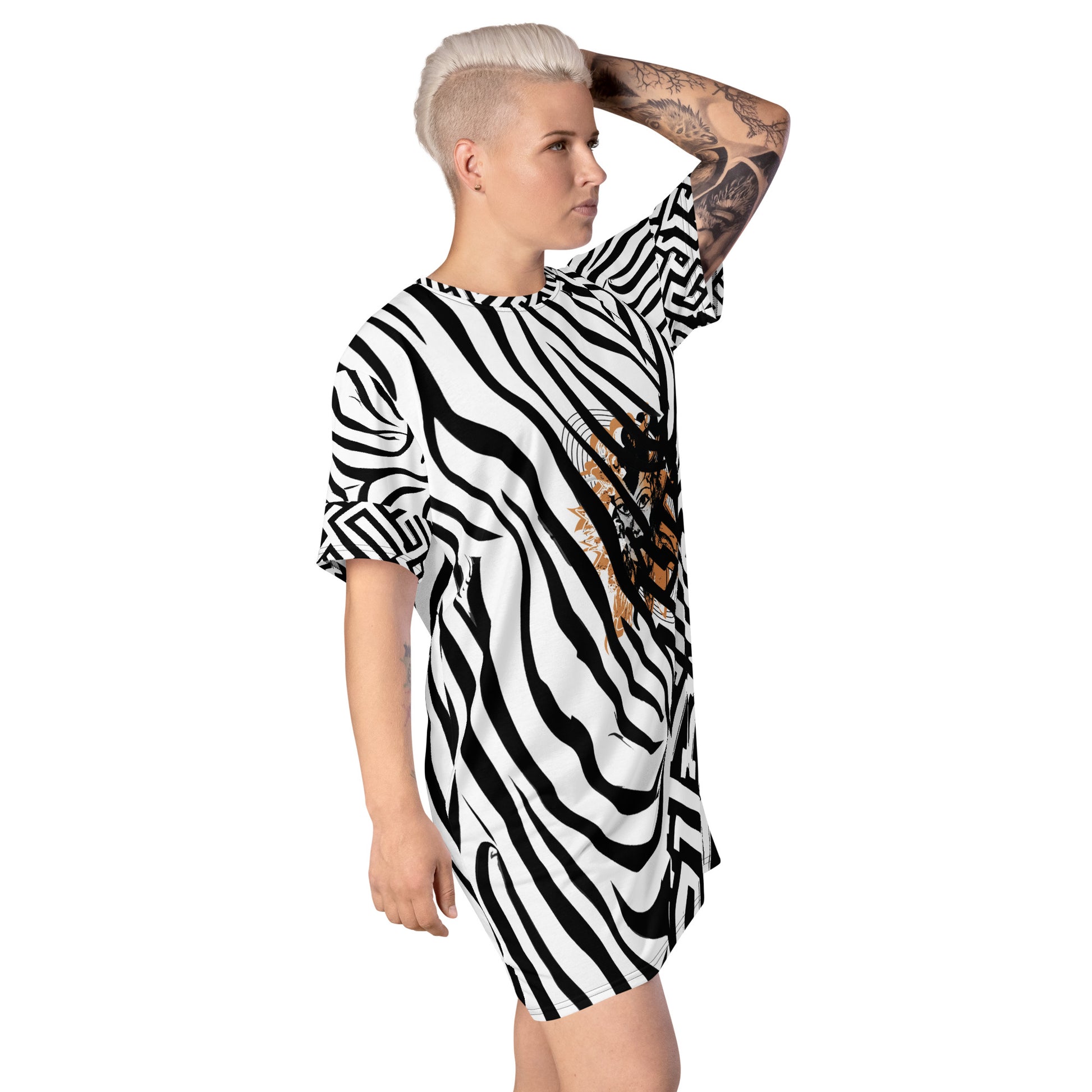 Model wearing bold black and white zebra print t-shirt dress from Kloe Store featuring an artistic face design in the center, showcasing unique streetwear style with abstract patterns and edgy fashion.