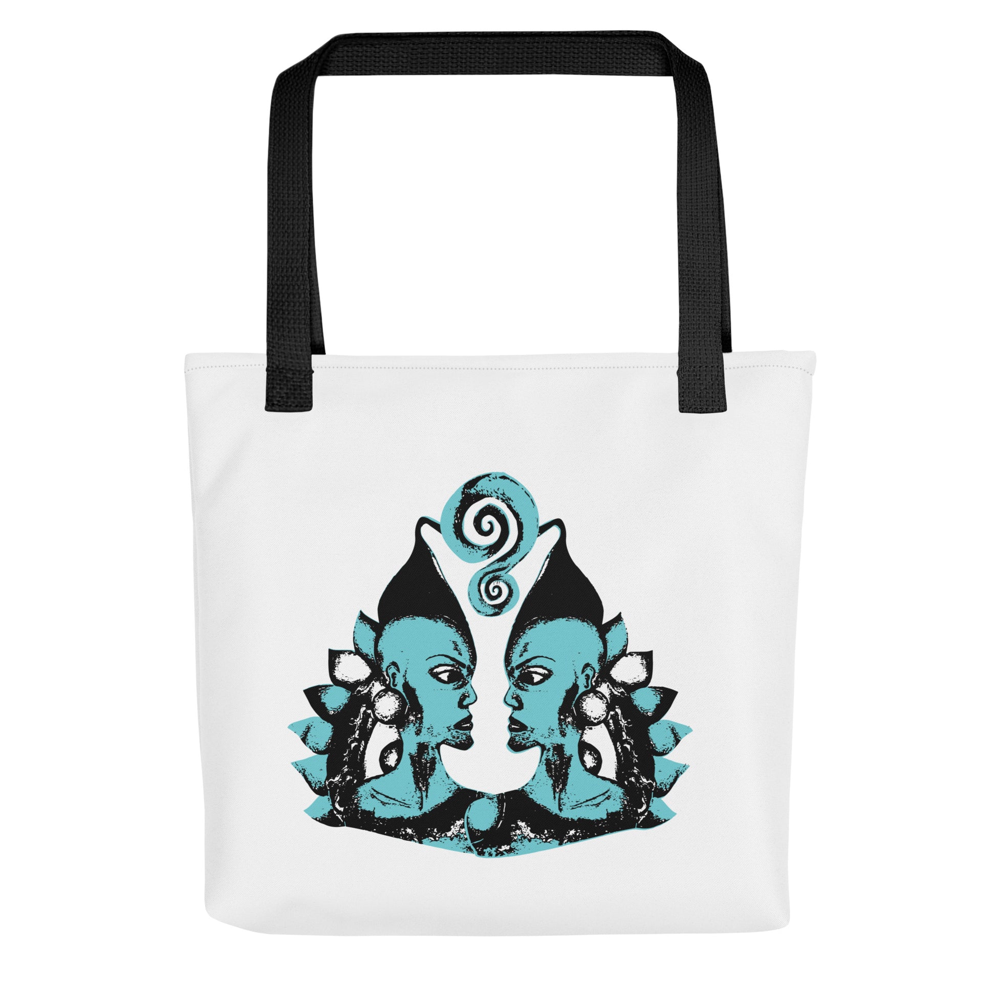 White tote bag with a bold K.L.O.E. hand-drawn design featuring two mirrored faces in black and teal, highlighting cultural inspiration, individuality, and modern bohemian self-expression.