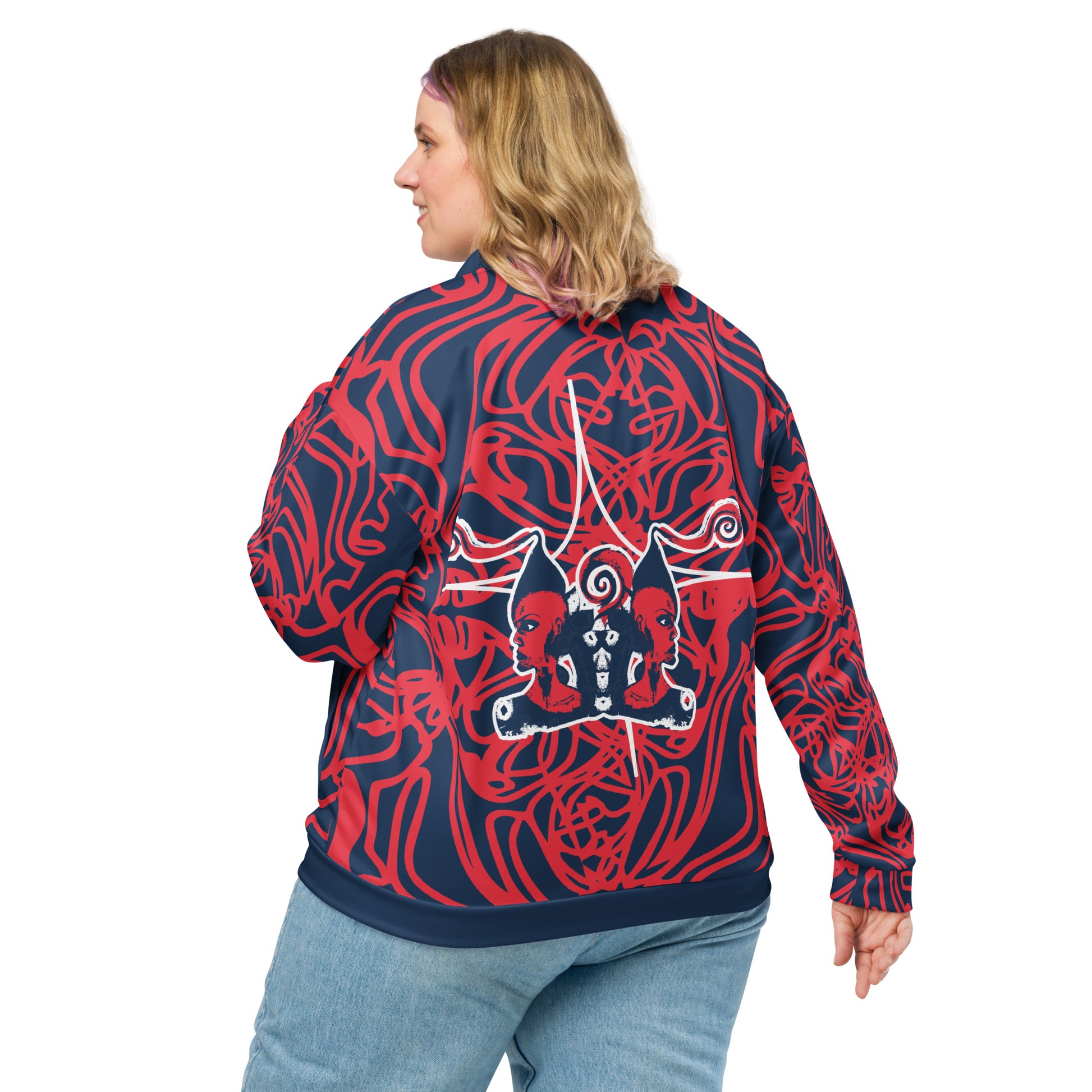 Bold navy and red streetwear bomber jacket featuring hand-drawn tribal patterns and mirrored face design, culturally inspired and crafted for a modern, edgy look – KLOE fashion.