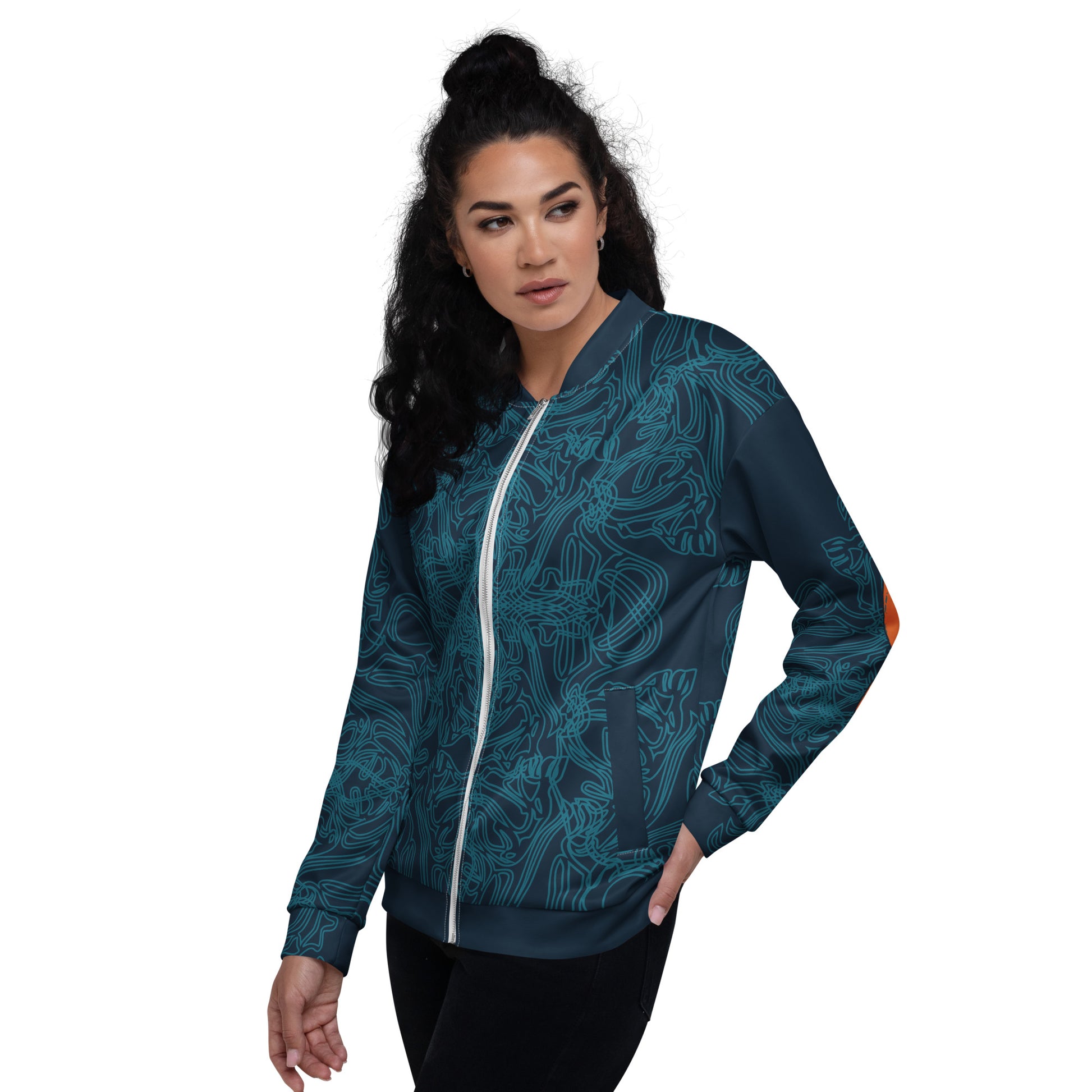 Front view of a navy blue bomber jacket with intricate cyan patterns, orange circular sleeve accents, and a zip-up closure, on a model.