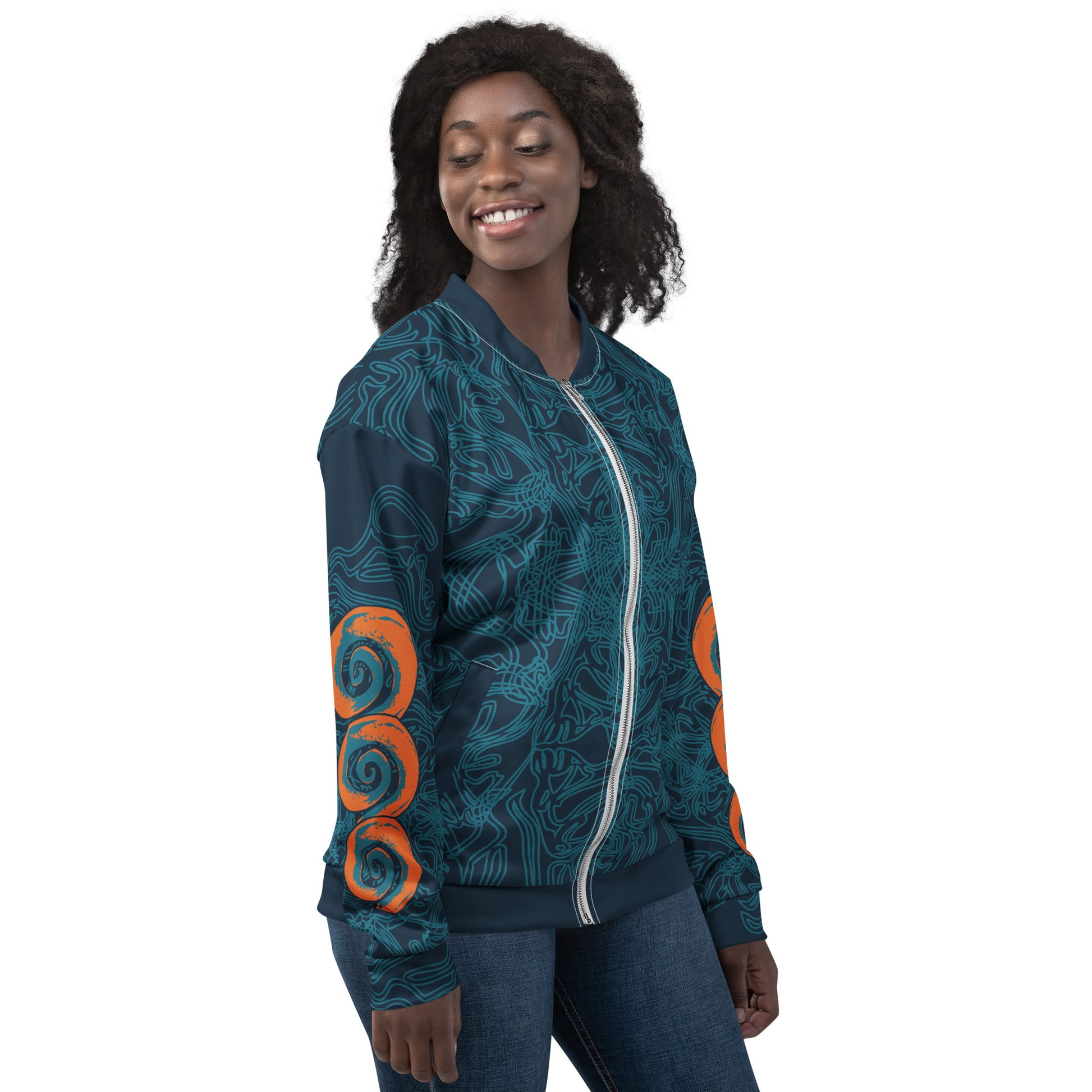 Front view of a navy blue bomber jacket with intricate cyan patterns, orange circular sleeve accents, and a zip-up closure, on a model.