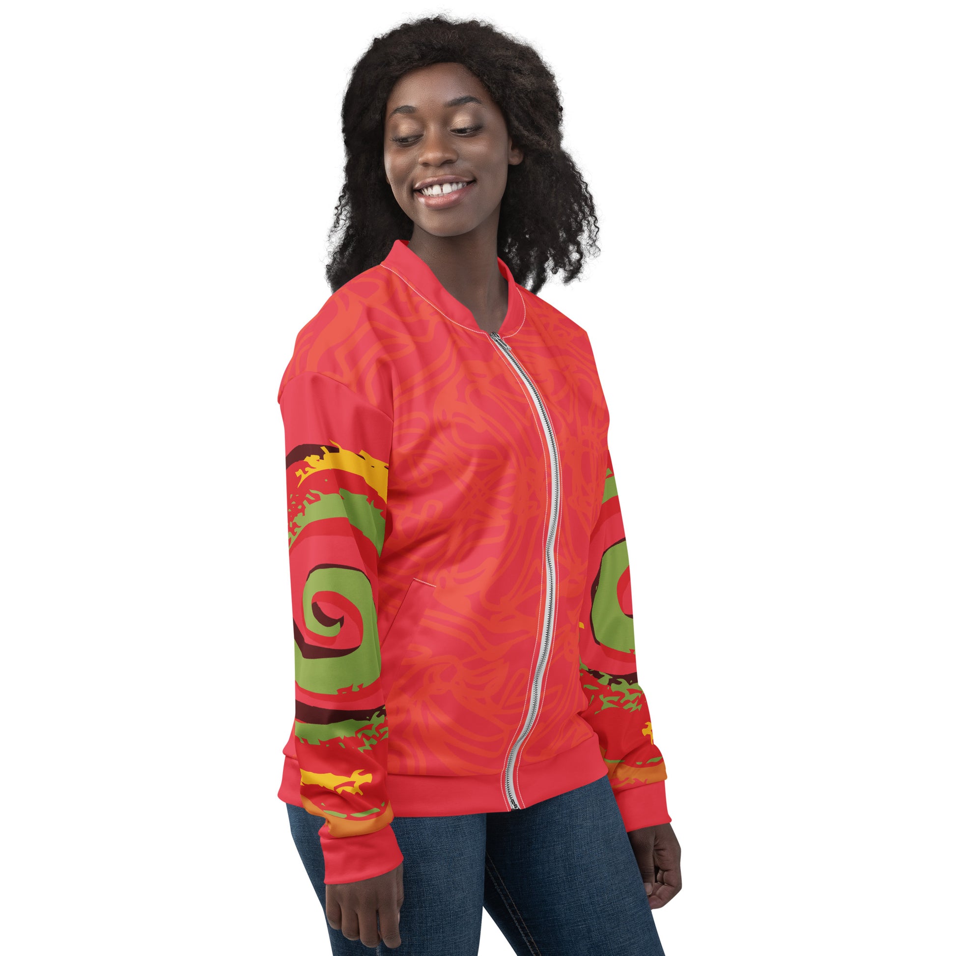 Red bomber jacket with vibrant swirl sleeve details and mirrored face design on the back, inspired by cultural art and bold self-expression.