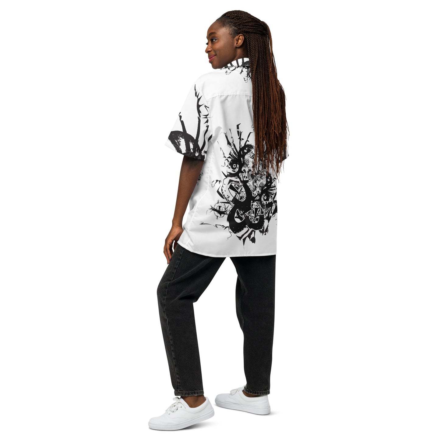 Back view of all-over print unisex button shirt by K.L.O.E showcasing intricate black hand-drawn illustration of two abstract faces intertwined with organic shapes and cultural motifs—celebrating artistic expression, identity, and evolution.