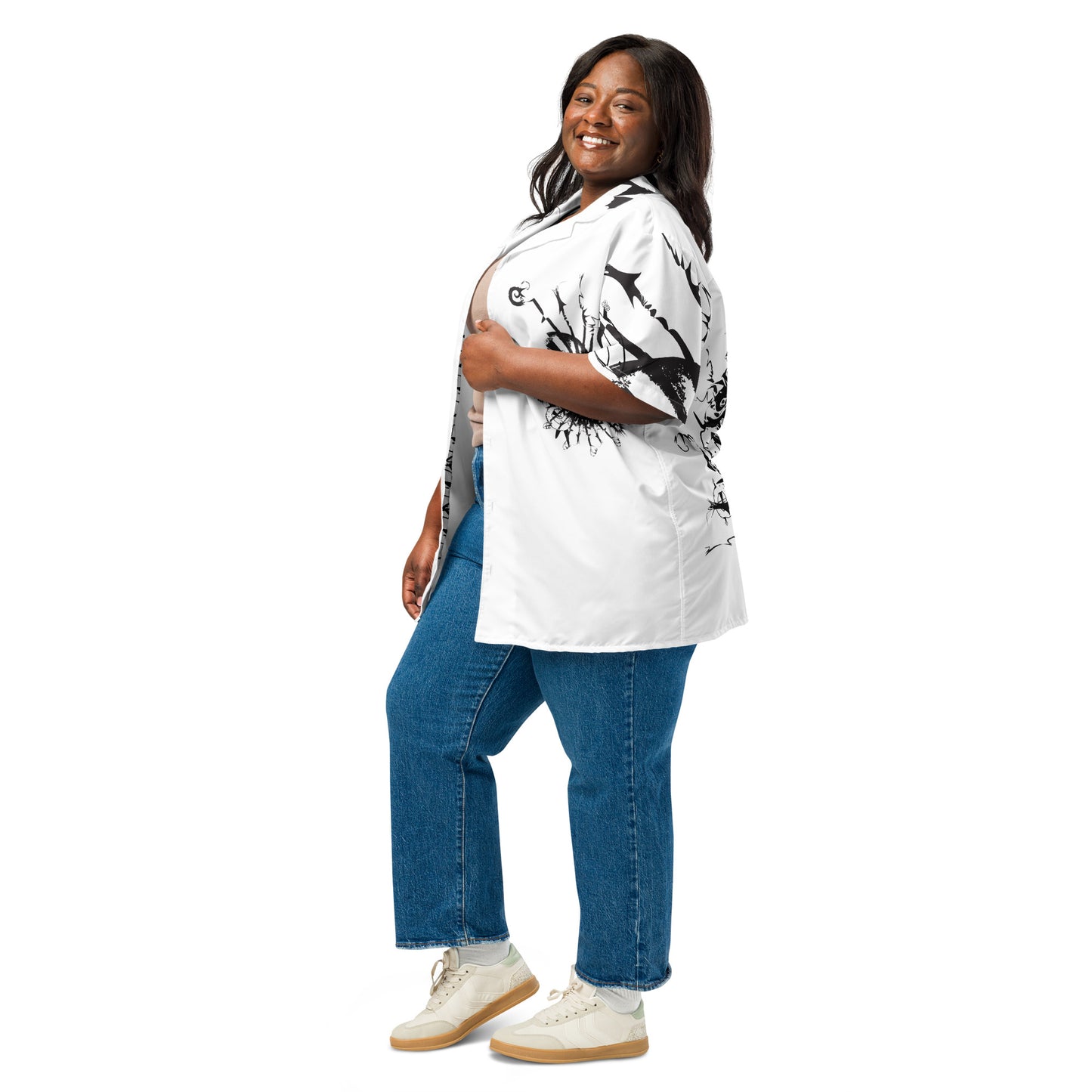 Side view of all-over print unisex button shirt by K.L.O.E featuring black hand-drawn, culturally inspired artwork across the front and sleeves—expressing individuality, transformation, and artistic symbolism through abstract design.