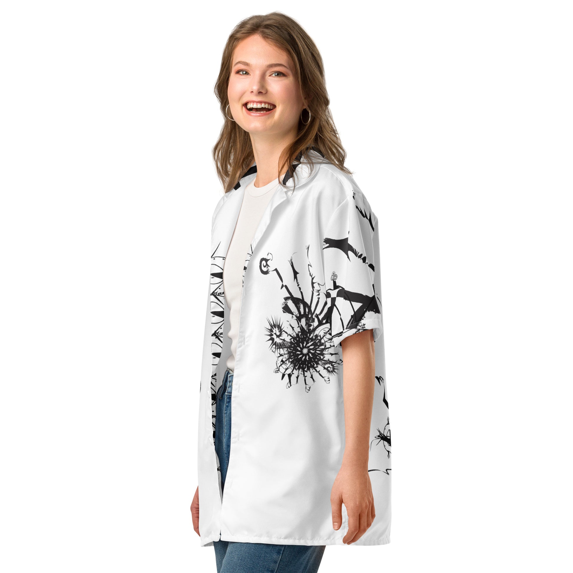 Front view of all-over print unisex button shirt by K.L.O.E featuring black hand-drawn, culturally inspired artwork across the front and sleeves—expressing individuality, transformation, and artistic symbolism through abstract design.