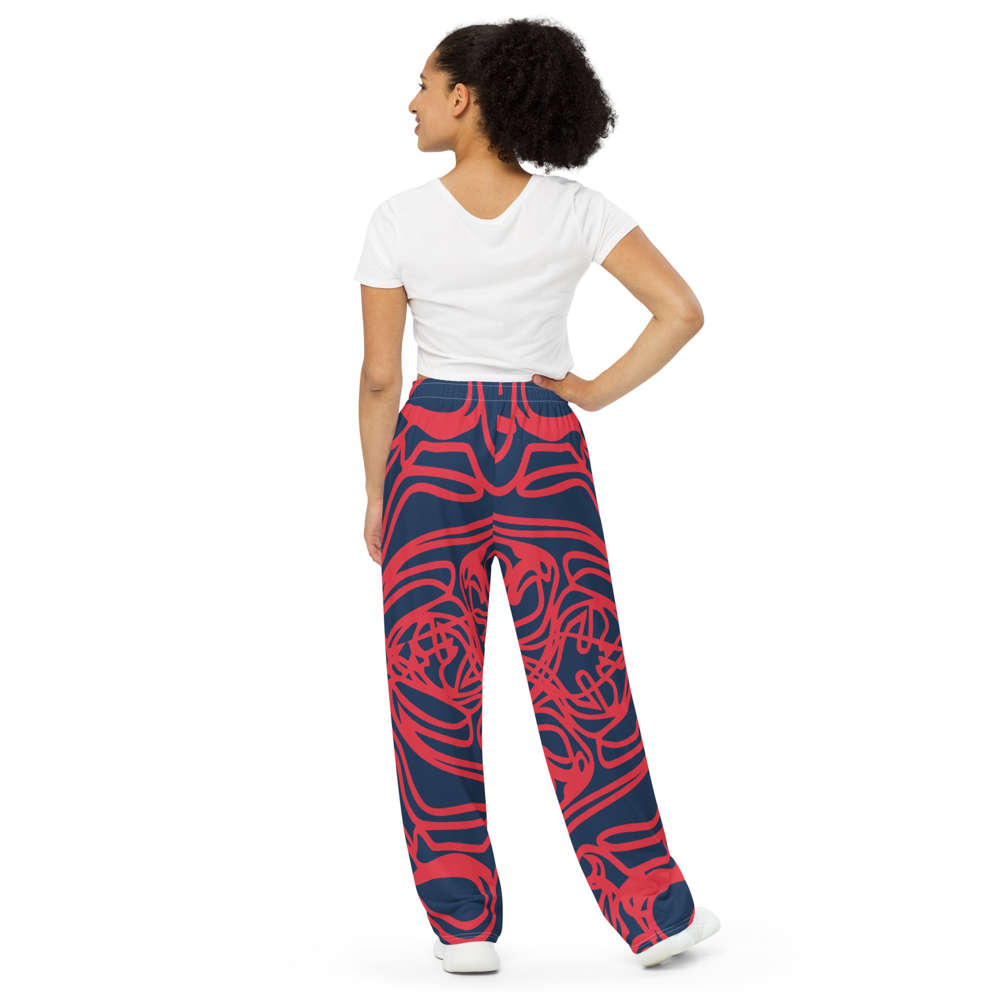 Bold navy and red streetwear pants featuring hand-drawn tribal patterns, culturally inspired and designed for a modern, relaxed fit with an edgy, artistic style – KLOE fashion.