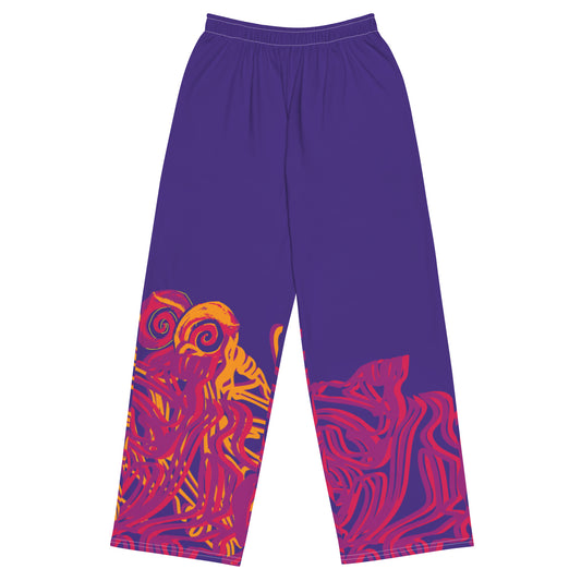Bold purple wide-leg pants with vibrant orange and red culturally inspired patterns, featuring abstract swirling designs — expressive fashion from KLOE’s The Secret Chambers of I & I collection.