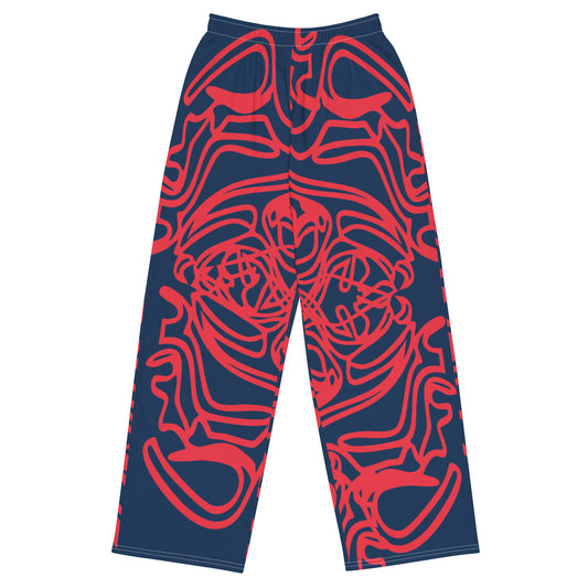 Bold navy and red streetwear pants featuring hand-drawn tribal patterns, culturally inspired and designed for a modern, relaxed fit with an edgy, artistic style – KLOE fashion.