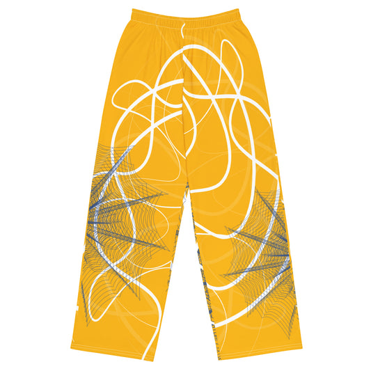 Golden yellow wide-leg pants featuring flowing white abstract line art and navy geometric patterns, merging expressive streetwear style with hand-drawn design from the Secret Chambers of I and I collection.