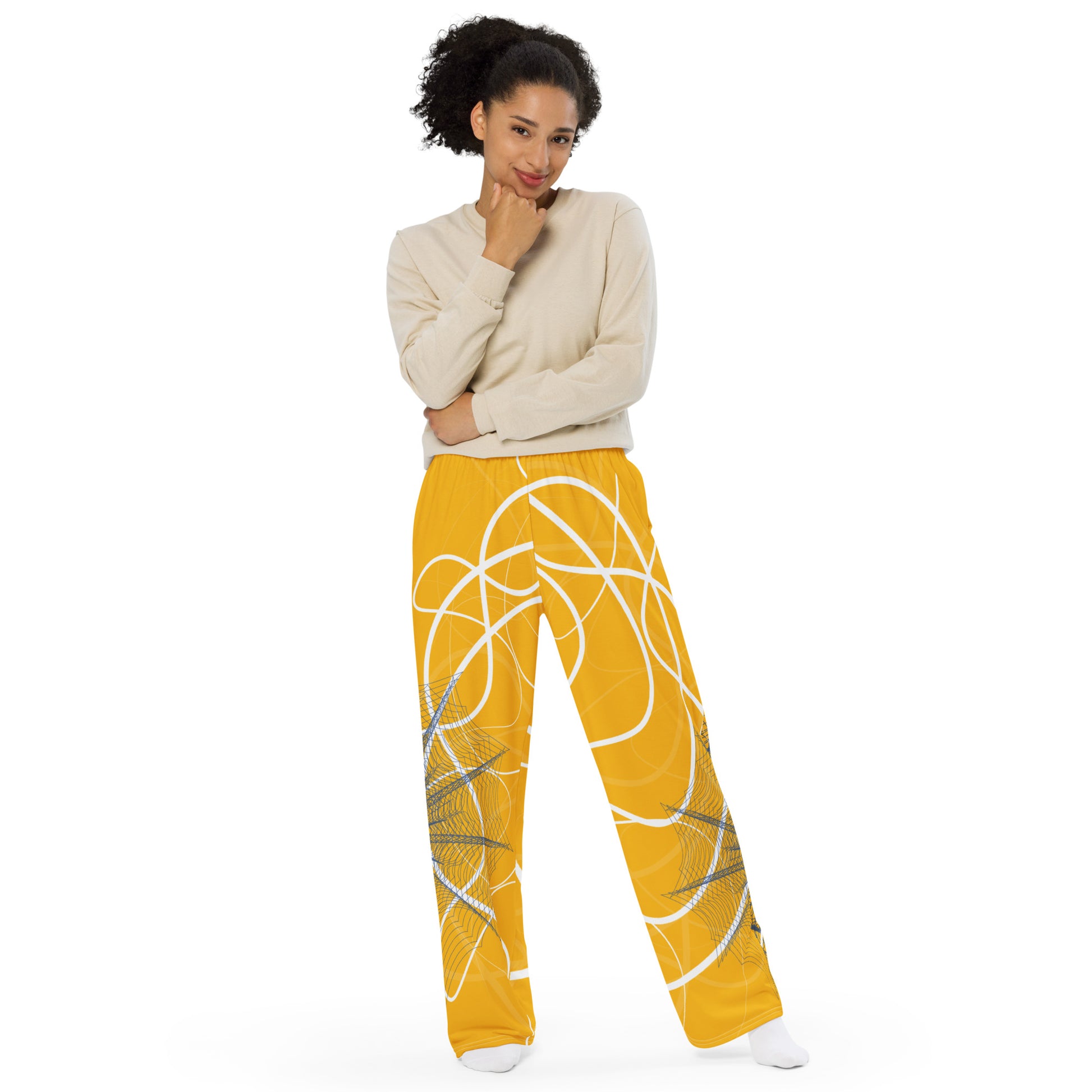 Golden yellow wide-leg pants featuring flowing white abstract line art and navy geometric patterns, merging expressive streetwear style with hand-drawn design from the Secret Chambers of I and I collection.