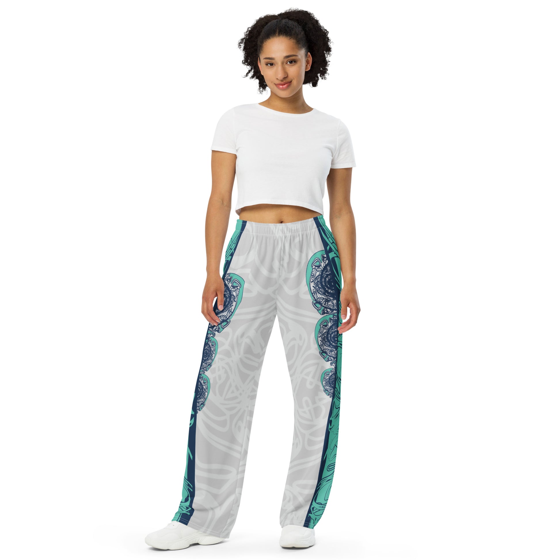 Unisex wide-leg pants with jade and navy abstract print, featuring dynamic spiral patterns and hand-drawn linework for a bold, artistic look.