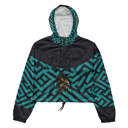 Kloe Store cropped windbreaker with bold green and black geometric patterns.