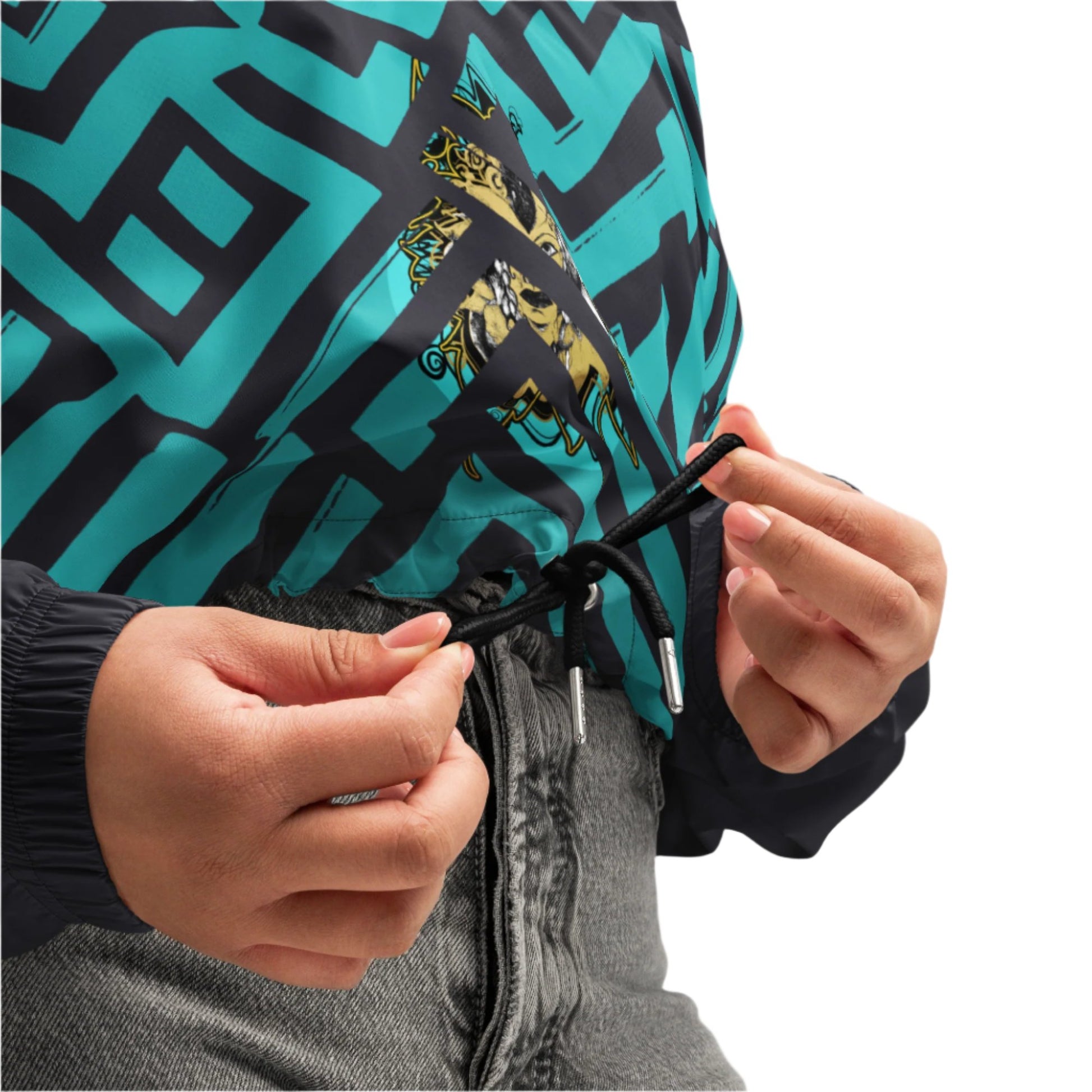 Confident woman wearing Kloe Store cropped windbreaker with bold green and black geometric patterns.