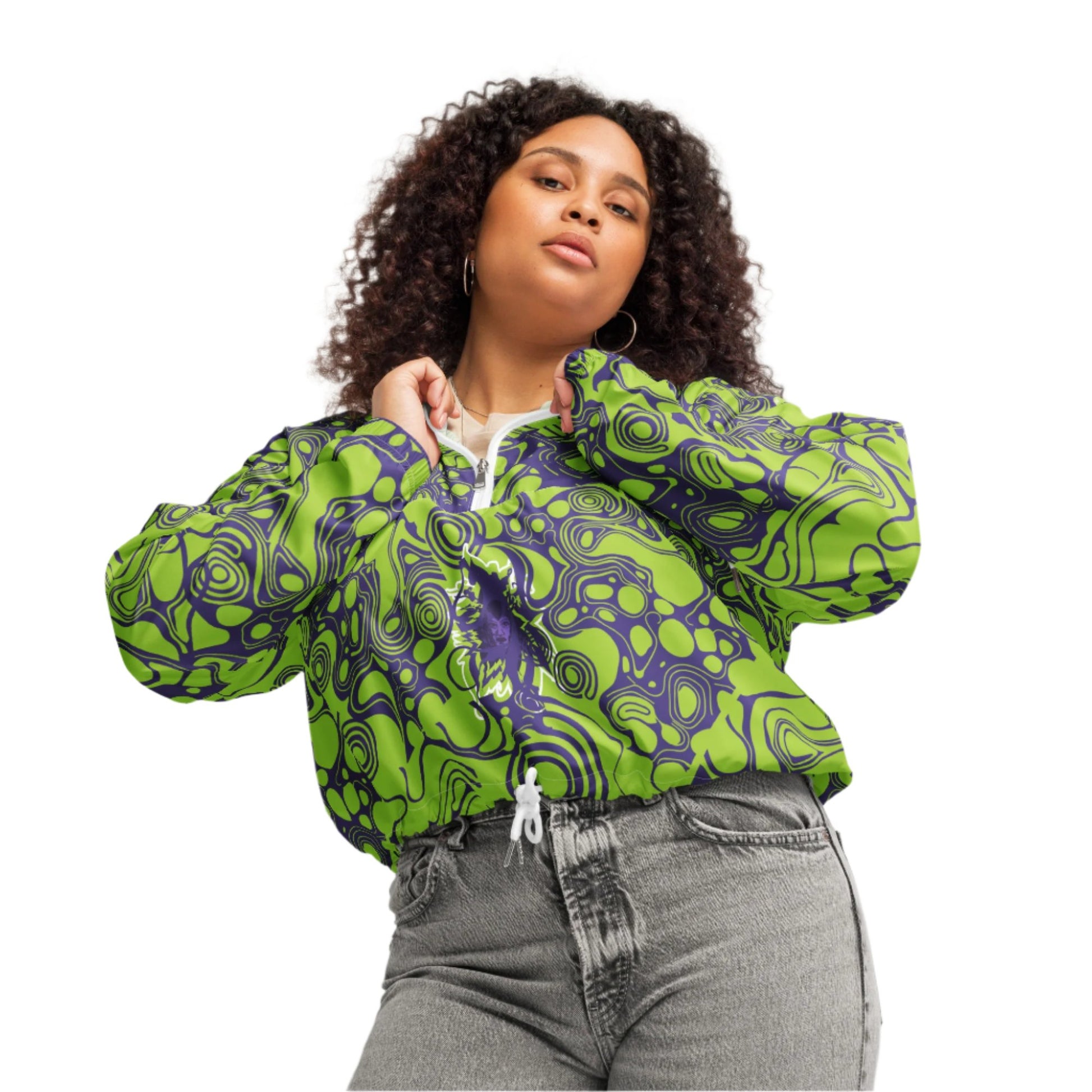 The model wearing green and purple cropped windbreaker from Kloe Store featuring bold abstract patterns and a unique artistic face design, ideal for a trendy streetwear look.