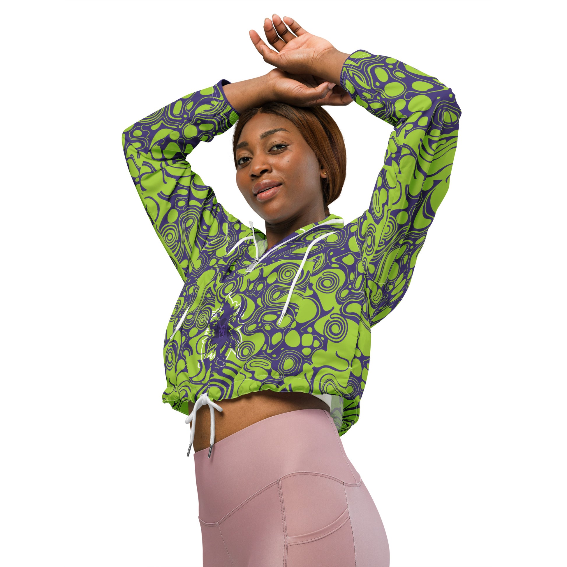 The model wearing green and purple cropped windbreaker from Kloe Store featuring bold abstract patterns and a unique artistic face design, ideal for a trendy streetwear look.