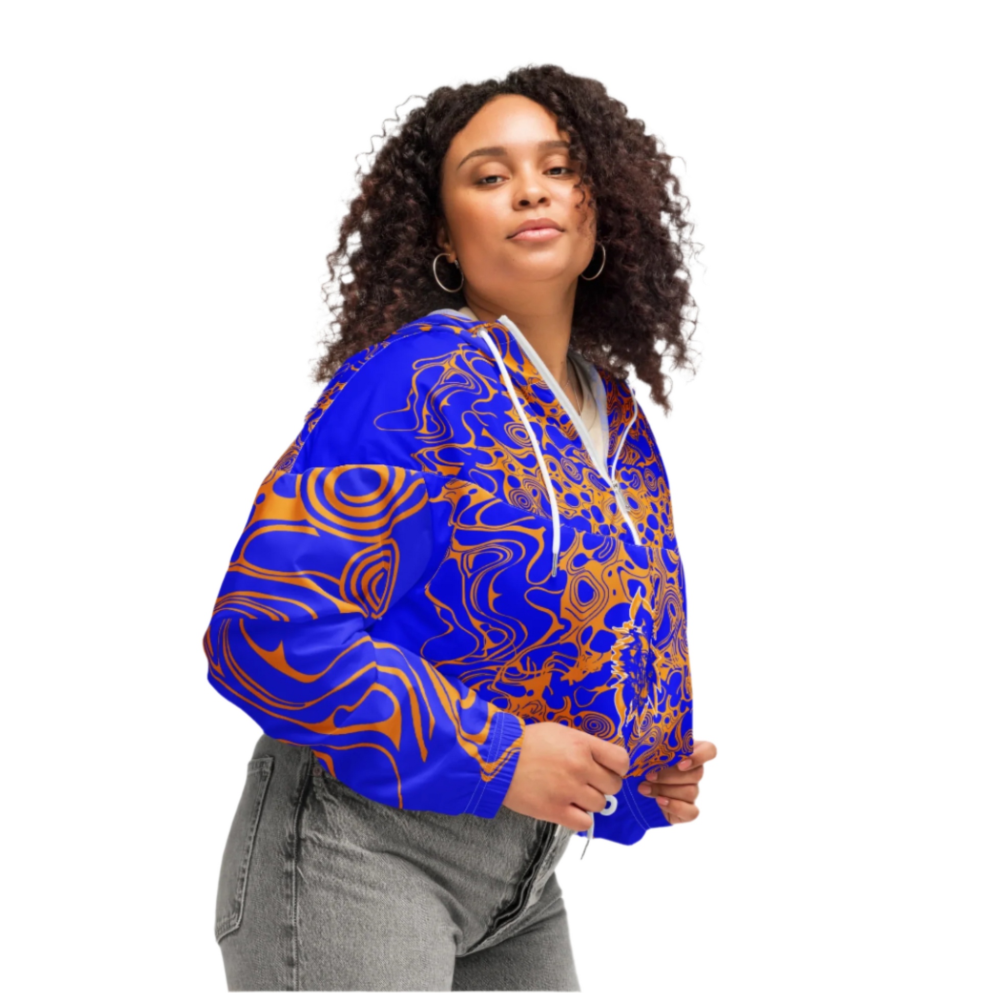 Product mockup - a model wearing vibrant blue and orange cropped windbreaker from Kloe Store featuring abstract swirl pattern, a front zipper, drawstring hood, and elastic cuffs, offering a stylish and modern streetwear look.