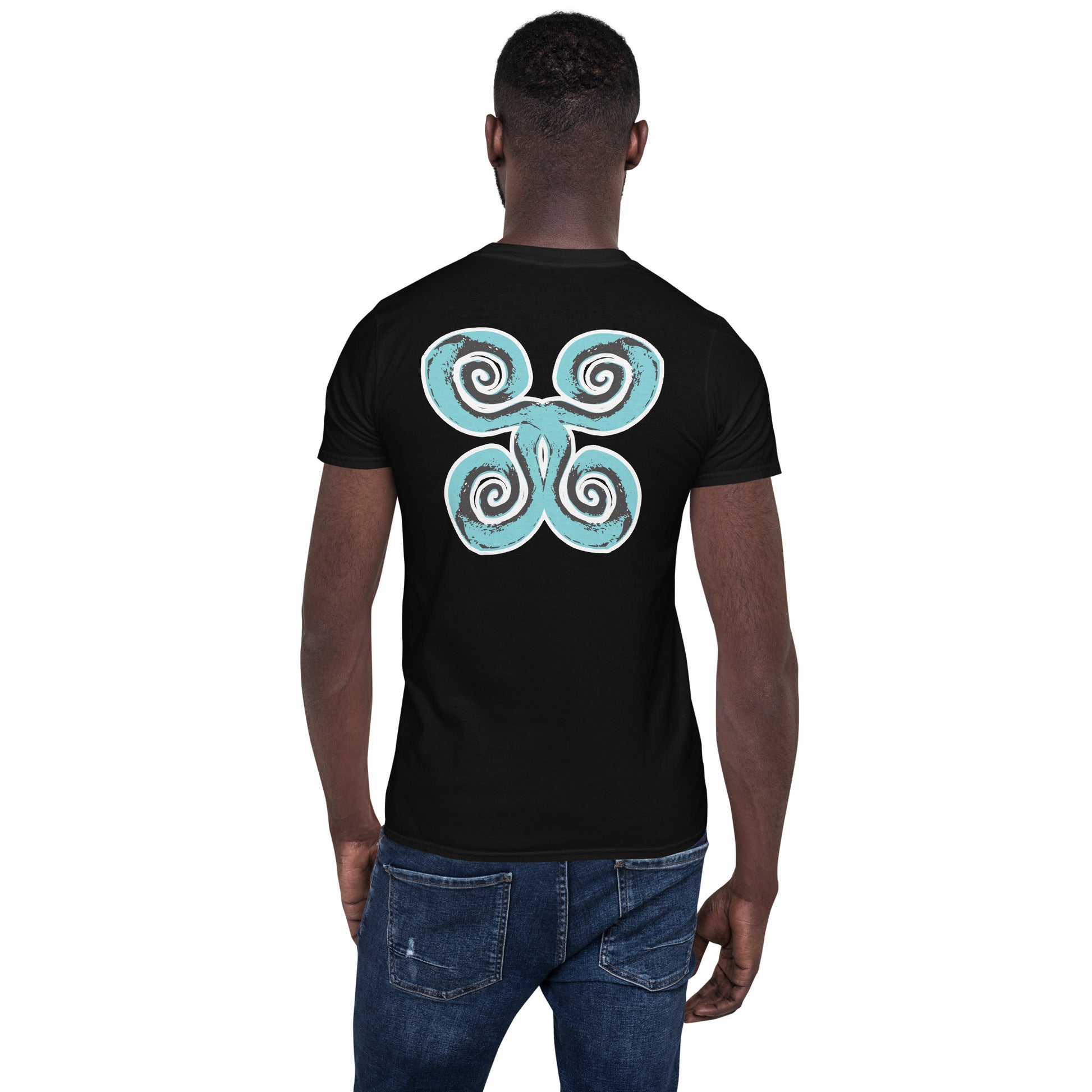 Back of black K.L.O.E. t-shirt with a bold, artistic design featuring four interconnected spirals in black and teal, inspired by cultural symbolism and bohemian artistry, worn by a model.